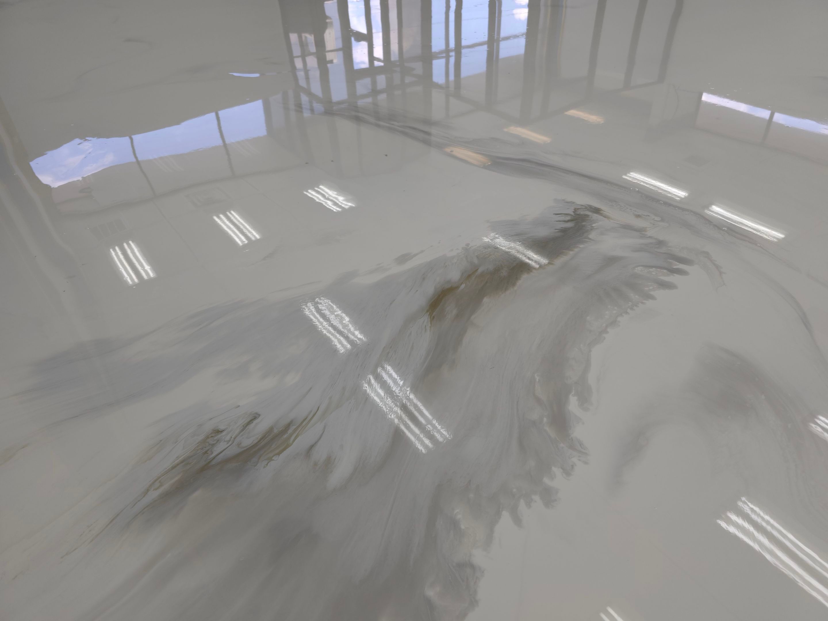 Jewelry Store Floor Gets a Beautiful Upgrade Using Metallic Epoxy by Elite Floor Solutions
