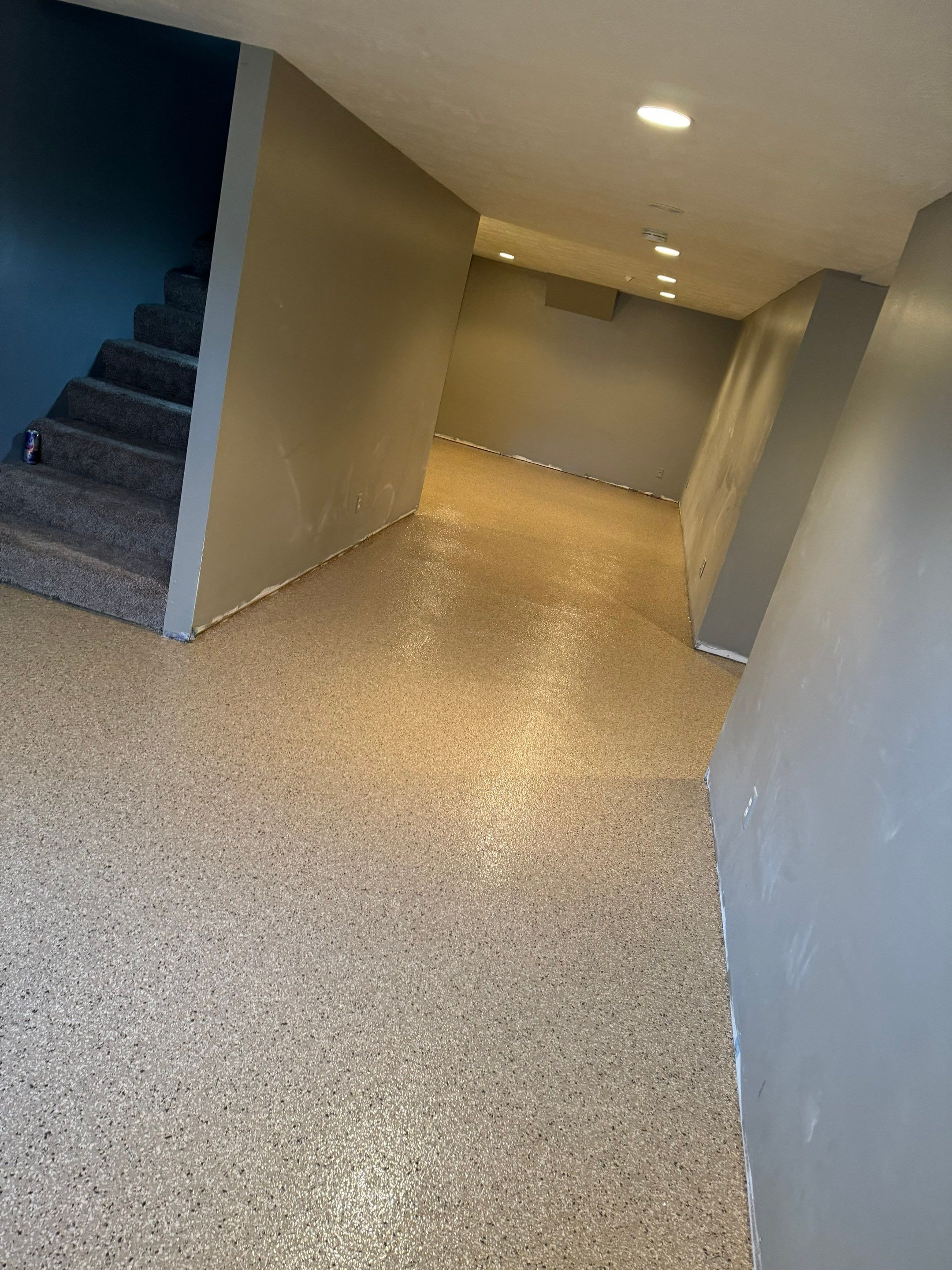 Custom Multi-Fleck Epoxy Floor Coating for Residential Basement by Select Painting, Coatings & Garage Cabinets