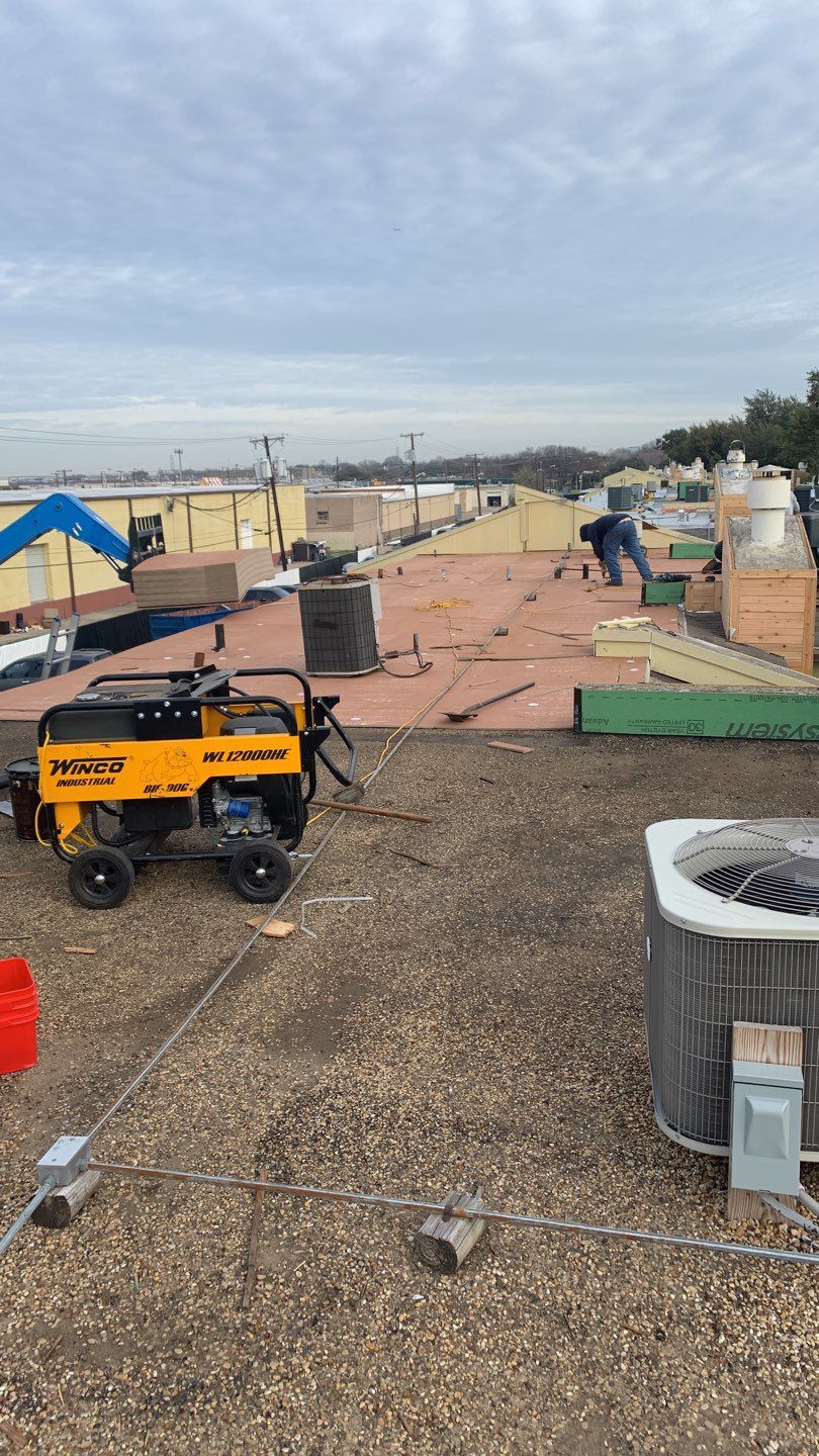 Apartment Roof Replacement by First Out Roofing 