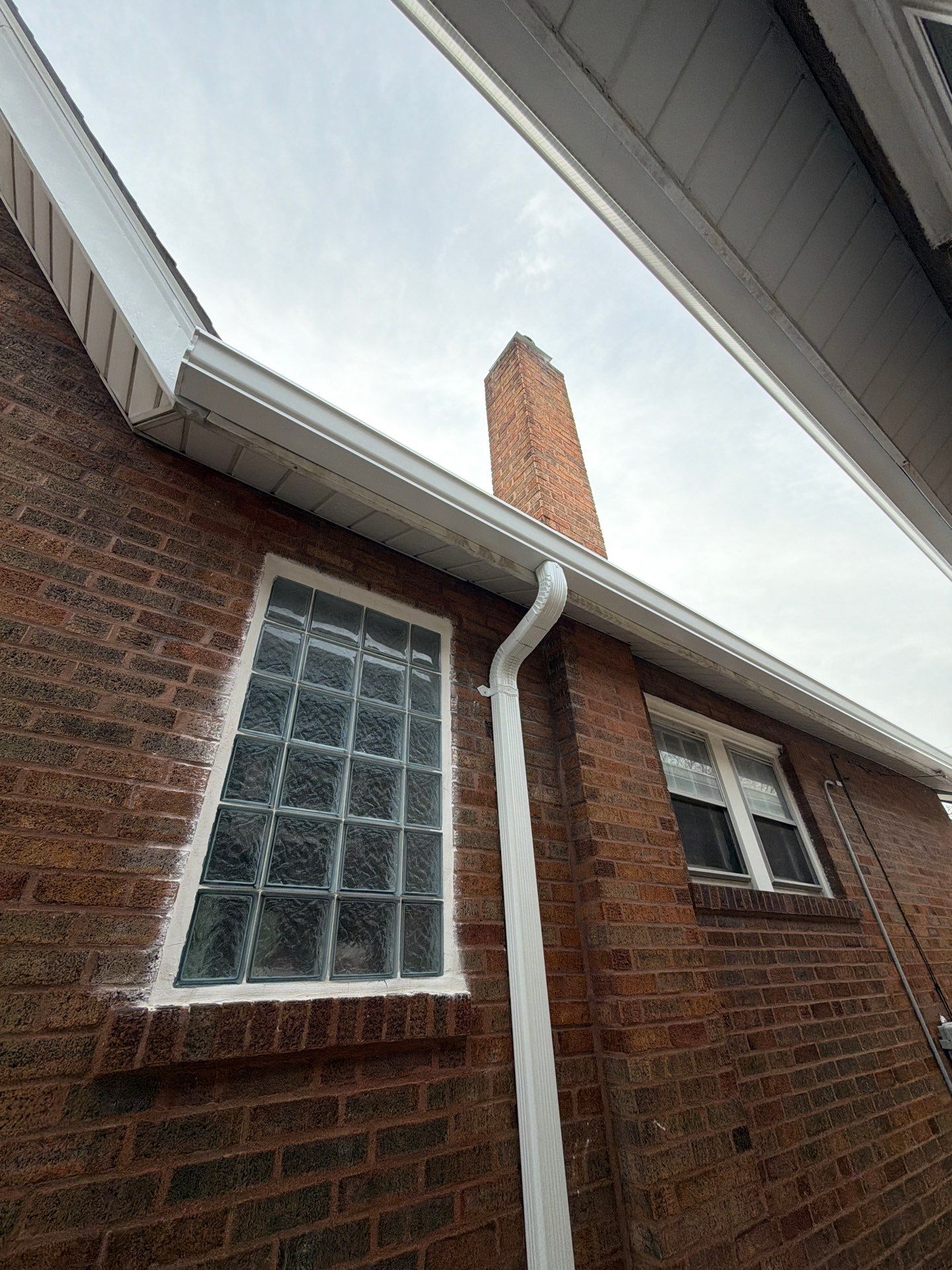 Holly Hills Storm Restoration: Soffit Repair & 6" Gutter Upgrade (South St. Louis) by Acute Roofing And Exteriors