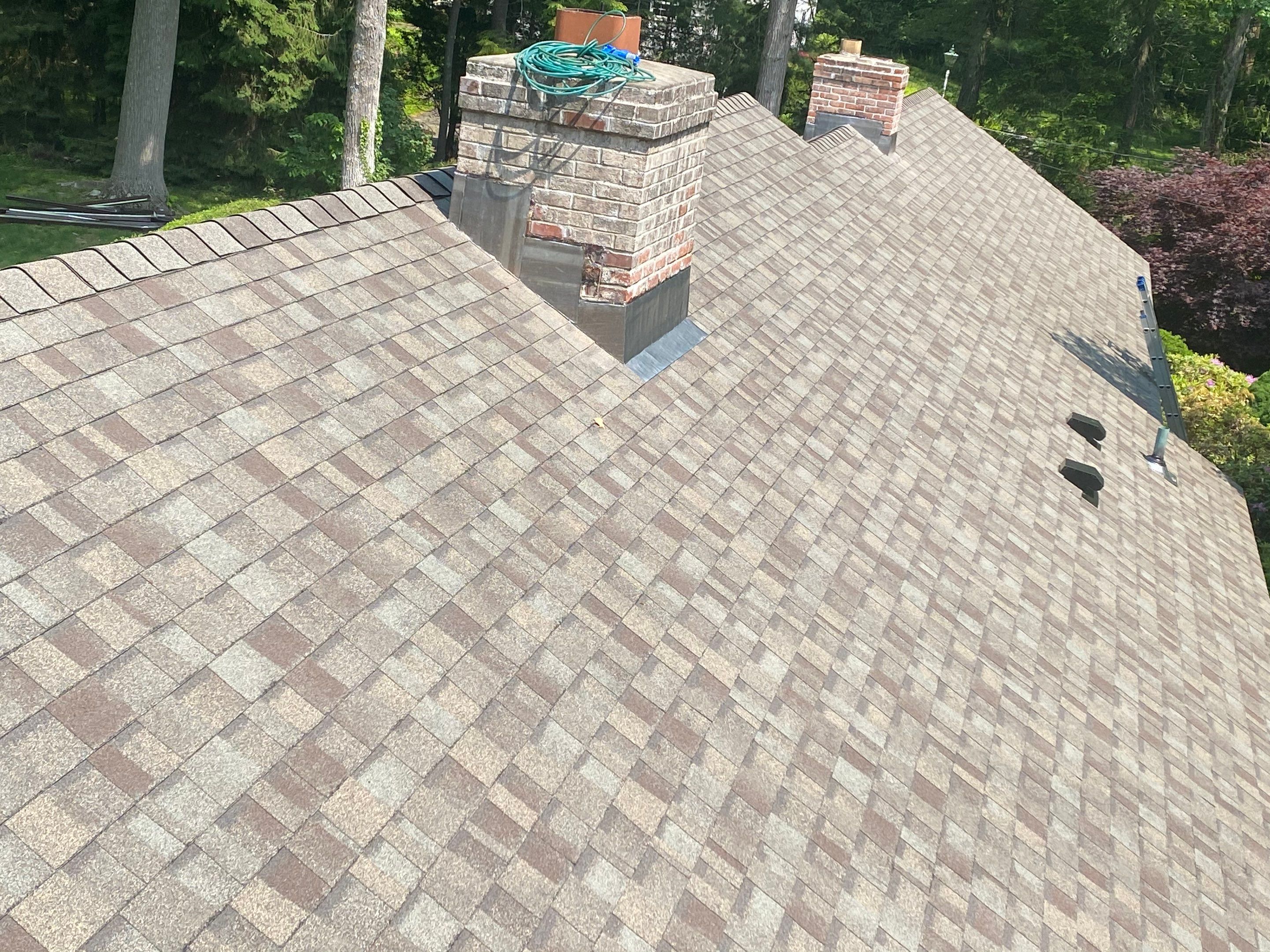 Commercial Roofing Installation using Owens Corning Duration Driftwood by A Plus Exterior
