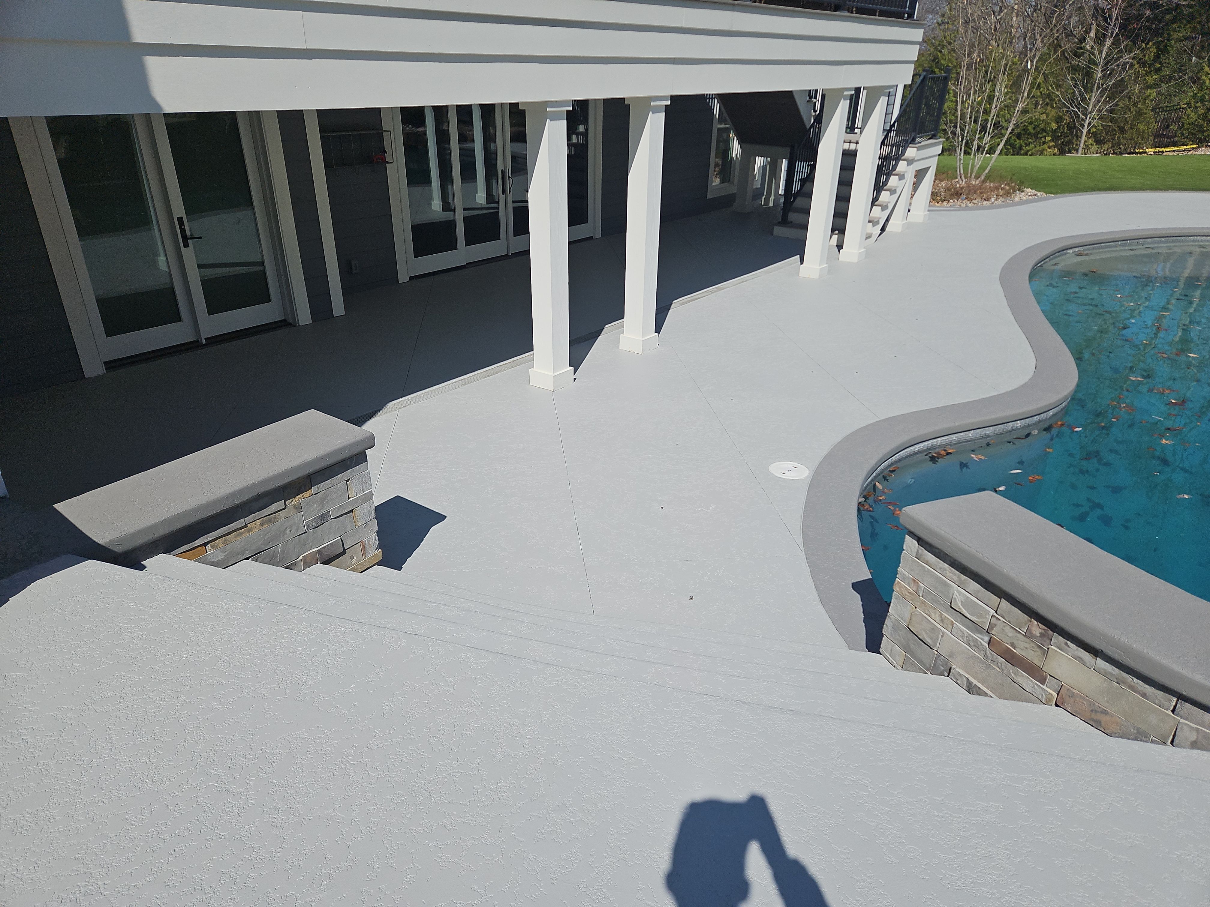 Stilwell, KS -- Pool Deck Resurfacing by Big Red Decorative Concrete, LLC