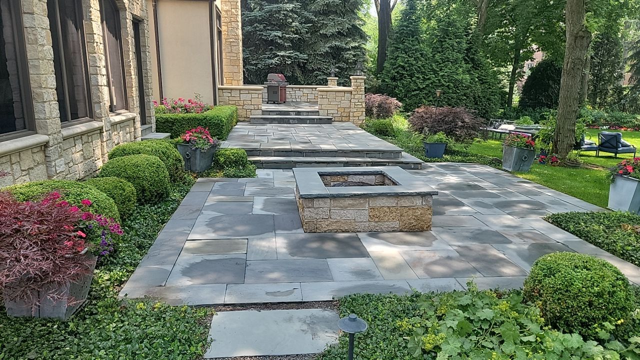 Northbrook, IL stucco home soft wash and stone cleaning by Northern Power Washing LLC.