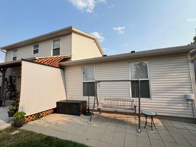 Add some Insulation and upgrade the Siding at the same time