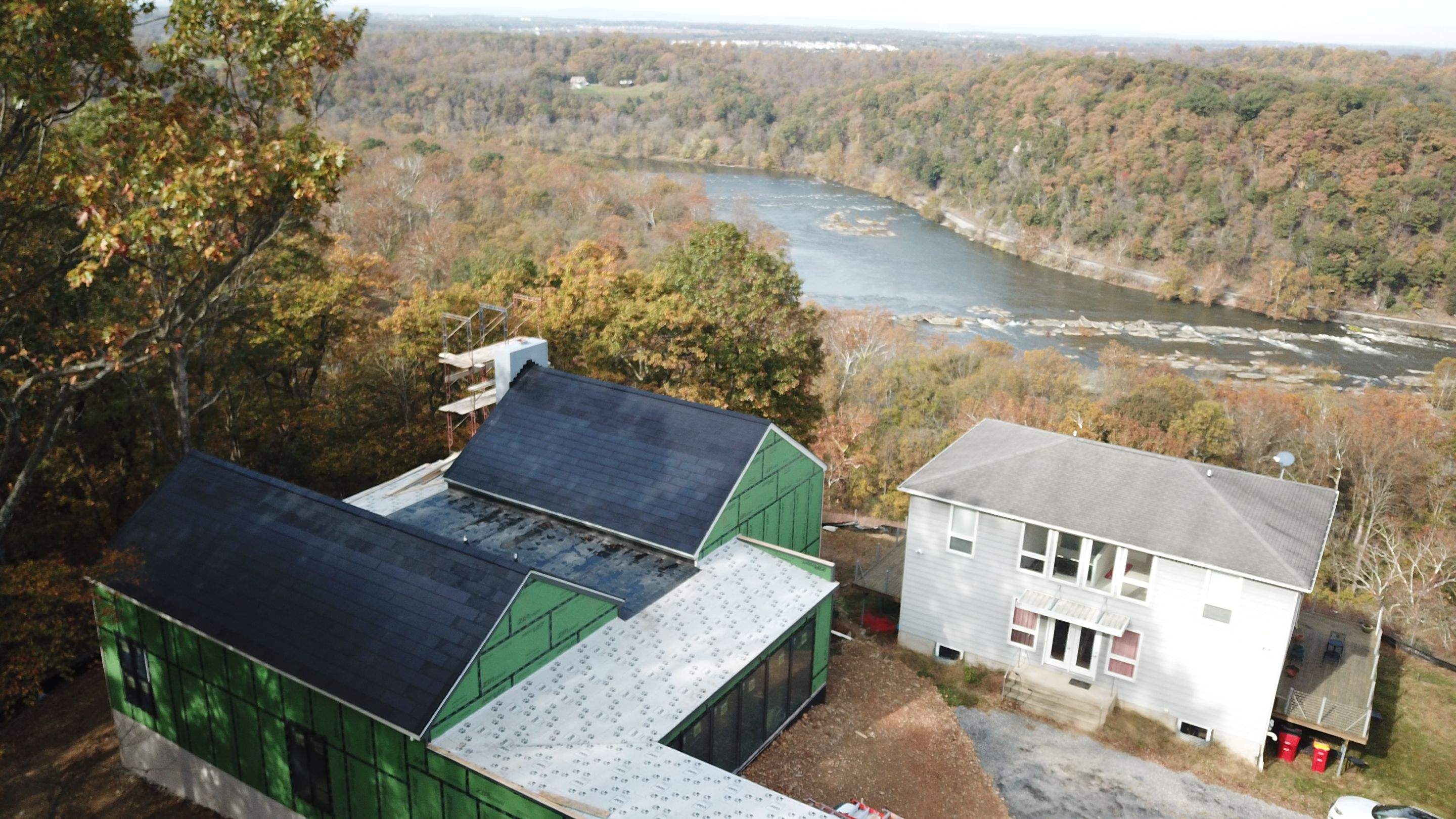 Roof Installation using Tesla Solar Roof V3 by American Home Contractors