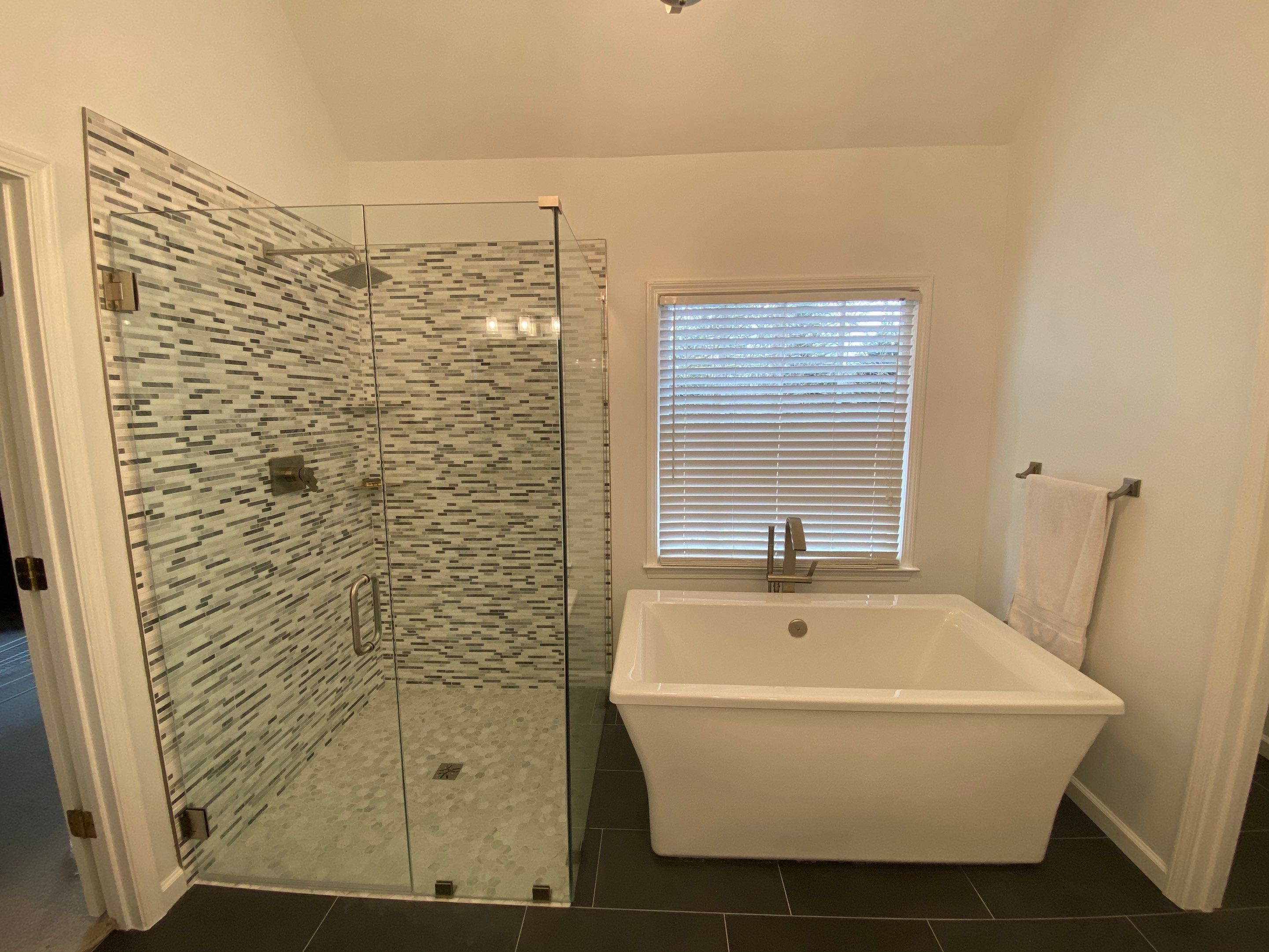 Modern Master Bathroom Remodel with Stacked Stone in Kennesaw by Swift Home Renovations
