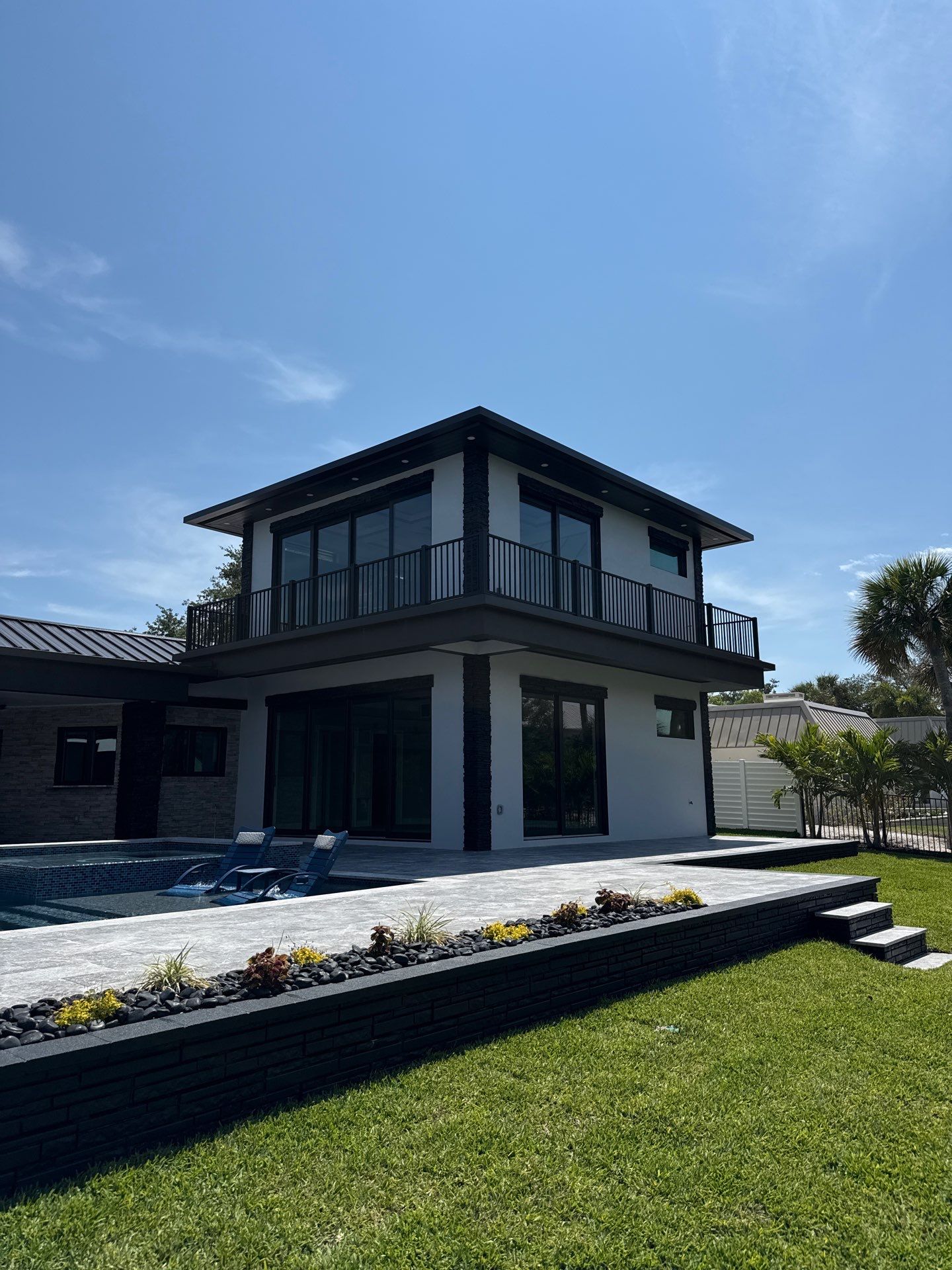 7-Inch Smooth Box Seamless Gutters using black seamless gutters in Siesta Key Fl by Gutter Professors
