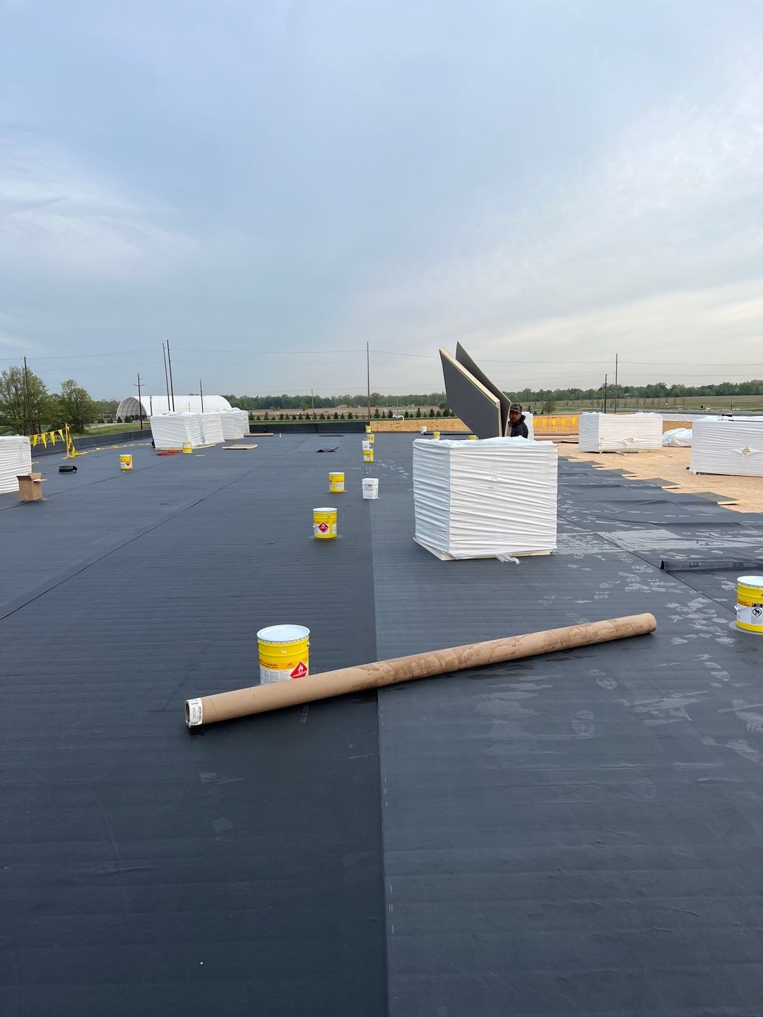 Commercial Roofing Installation using 60 mil rubber roof  by Nitro Roofing and Construction
