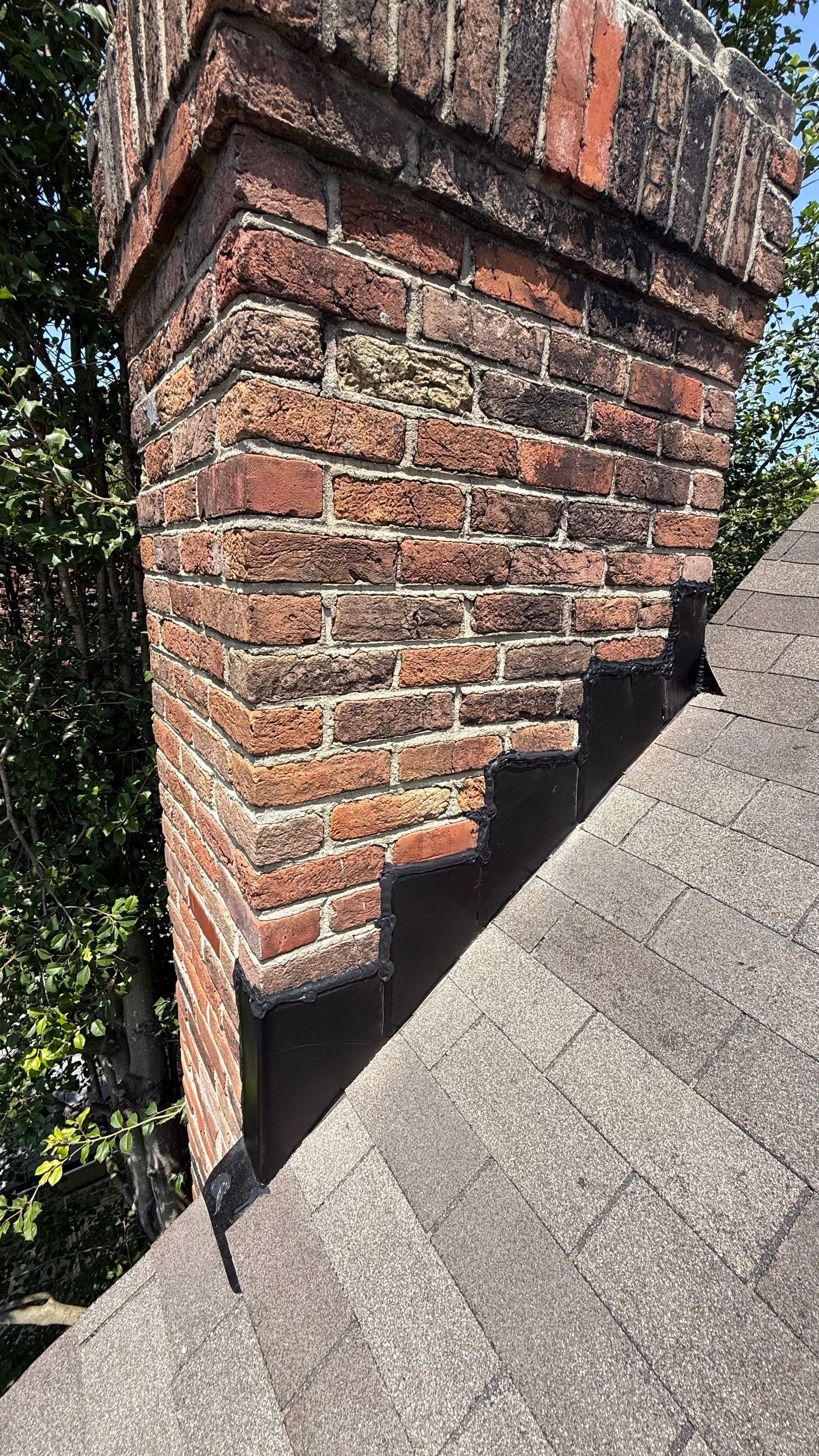 Flashing and Multi-Flue Cap in Norfolk by Premier Chimney and Roofing