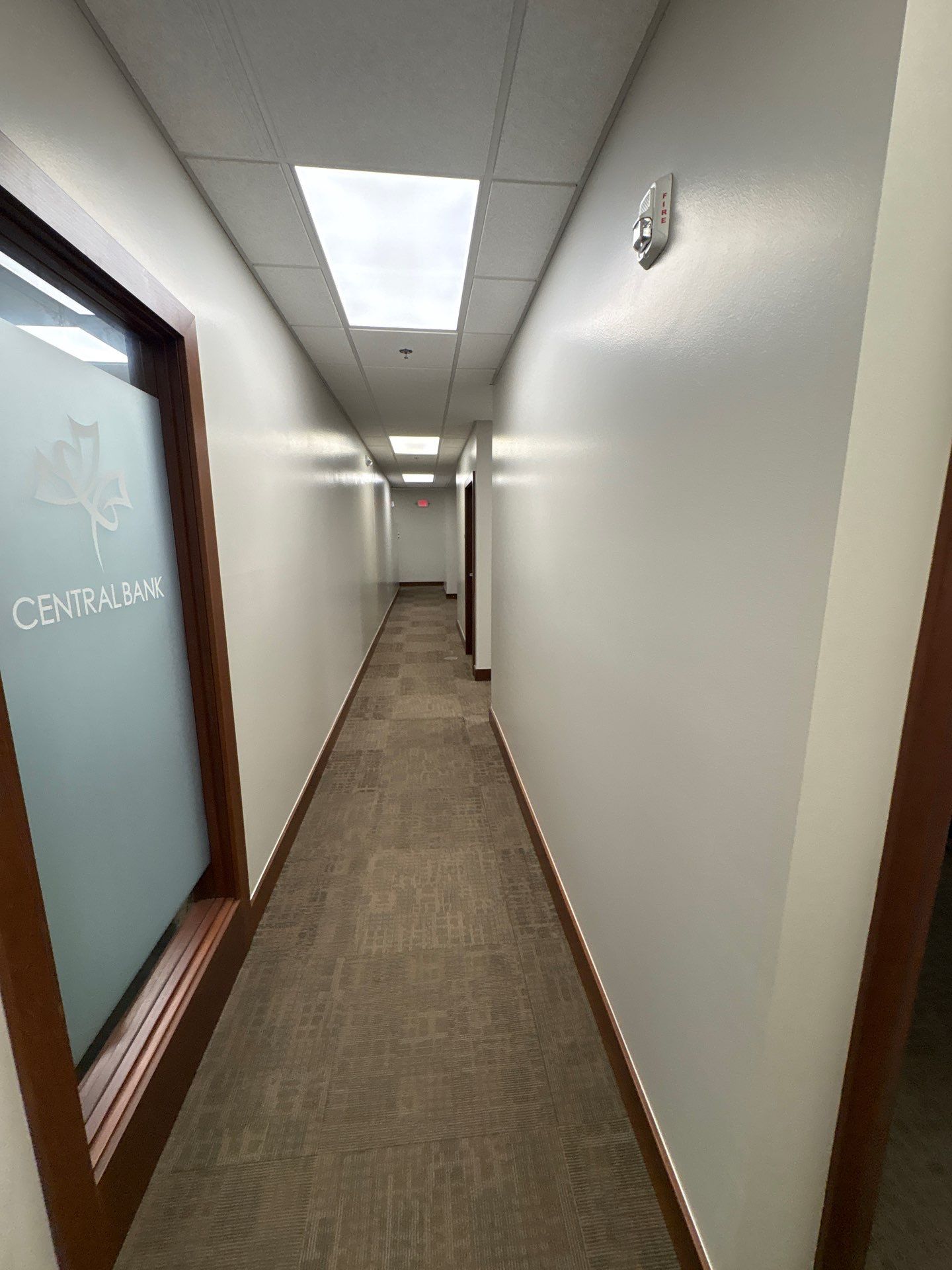 Commercial Office Interior Remodel and Modern Suite Refresh in Sioux Falls by Select Painting, Coatings & Garage Cabinets