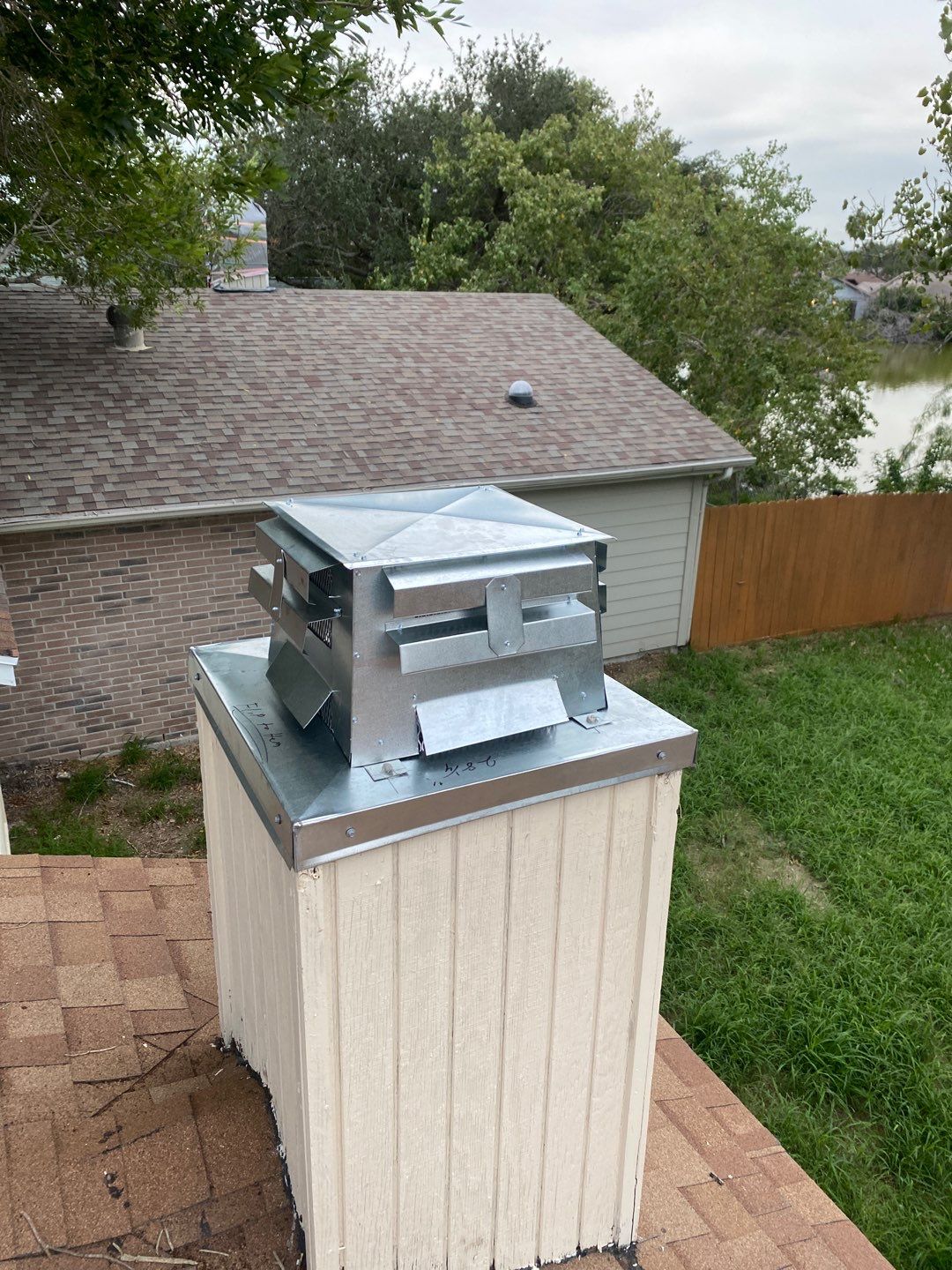 Chimney Cap Replacement using Custom Fabricated Steel by Lighthouse Roofing