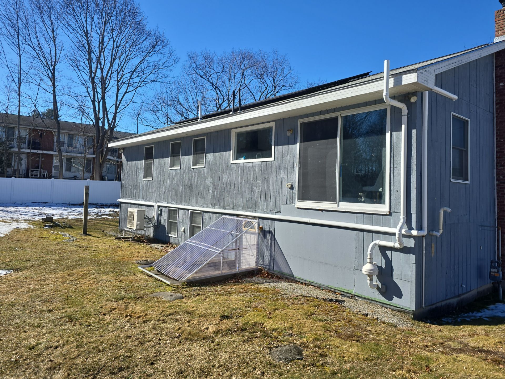 Vinyl siding project in Natick, MA by UBrothers Construction