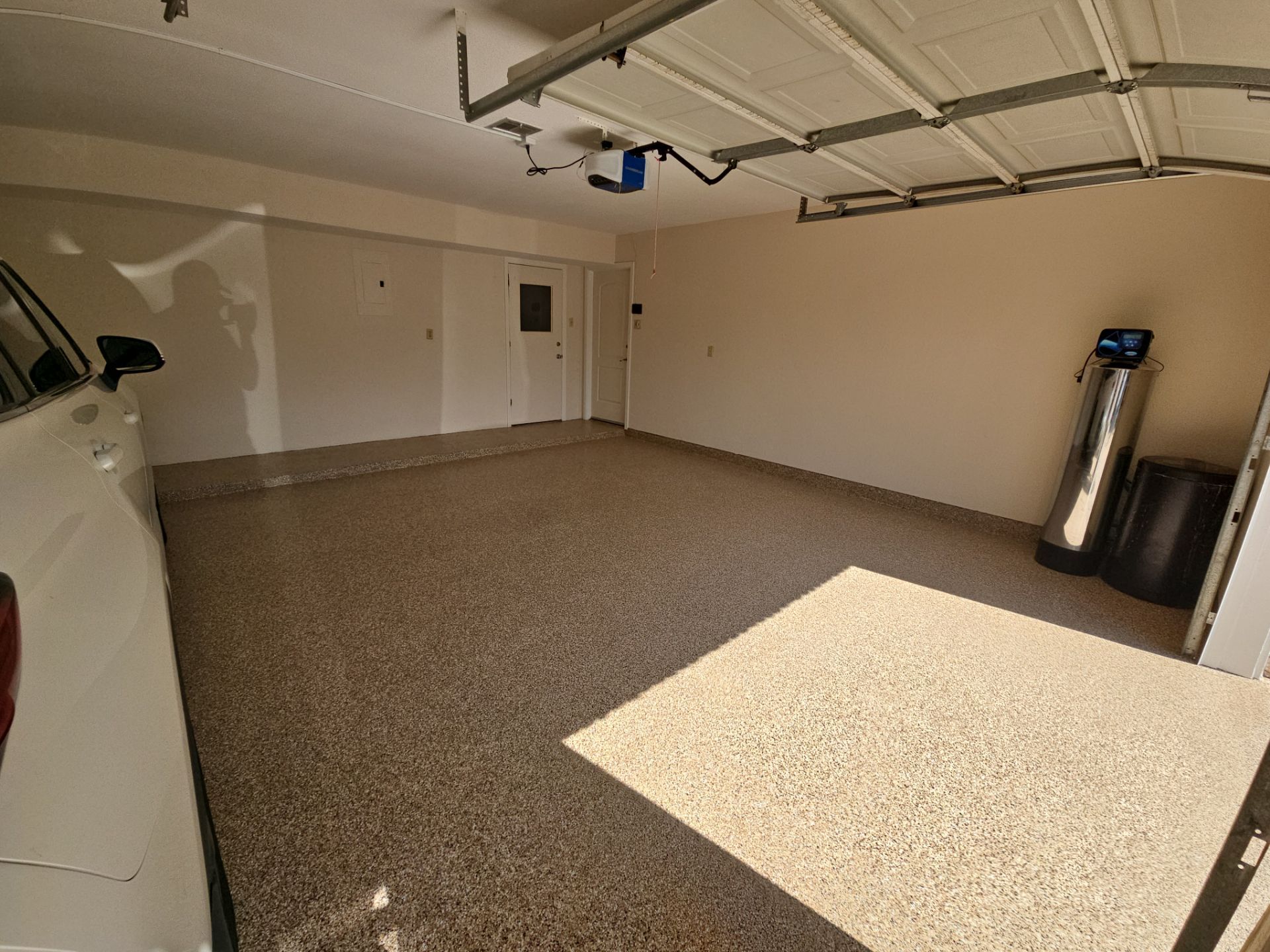 Garage Floor Coating and Crown Moulding Install  by Regal Renovate