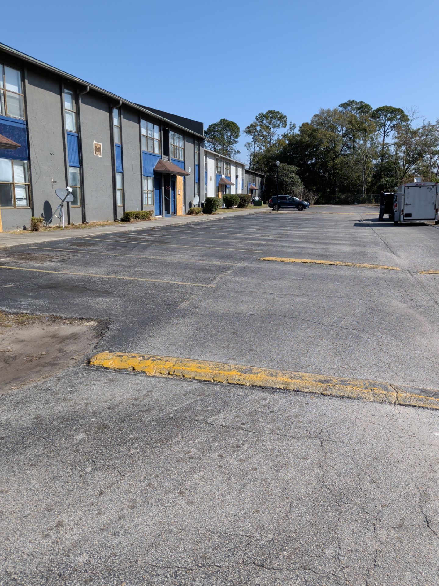 Commercial Landscape Cleanup & Weekly Maintenance — Grassy Pond Apartments by Harmoni Home Services