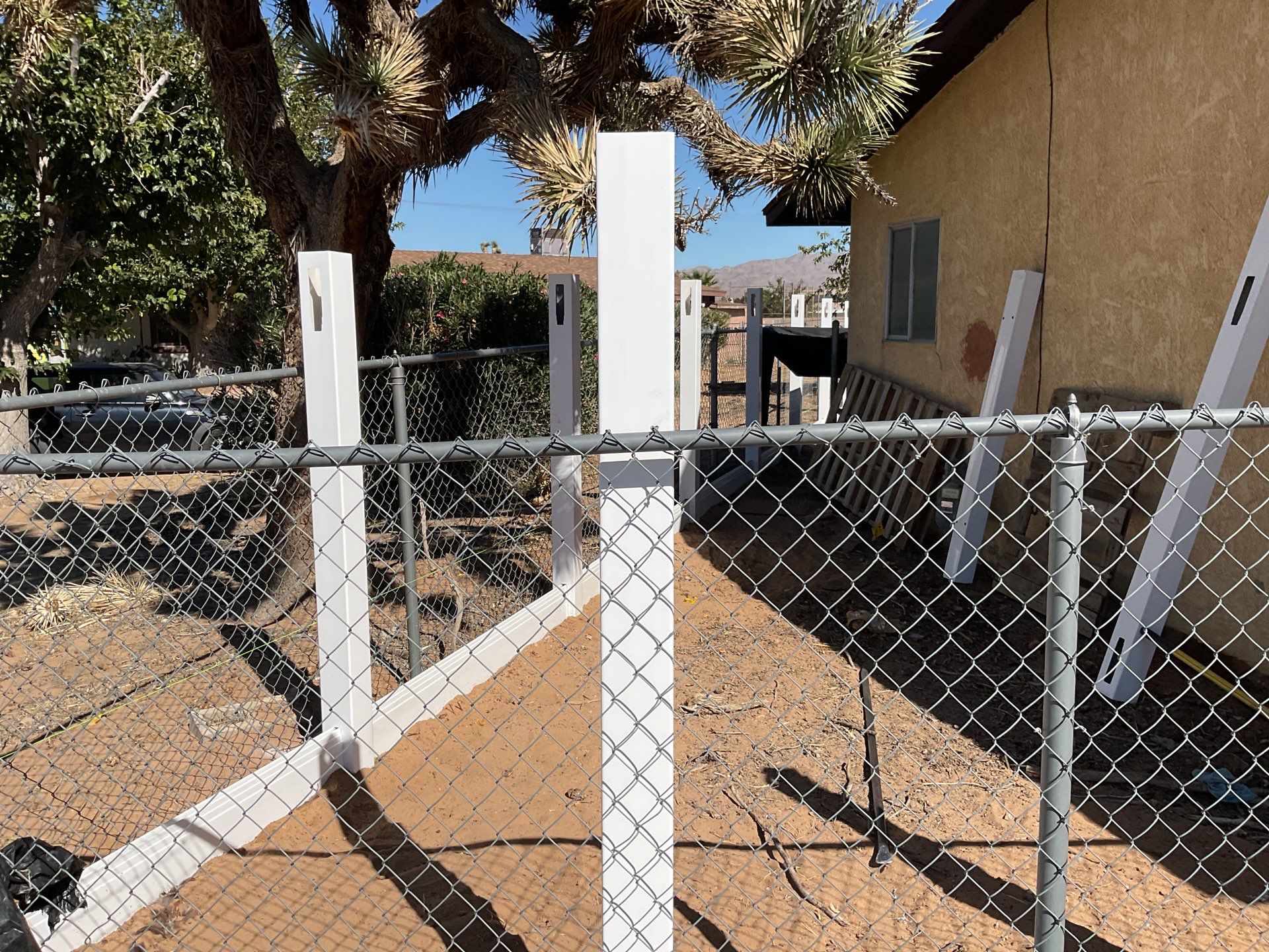 White picket fence  by Fence Guys Inc. 