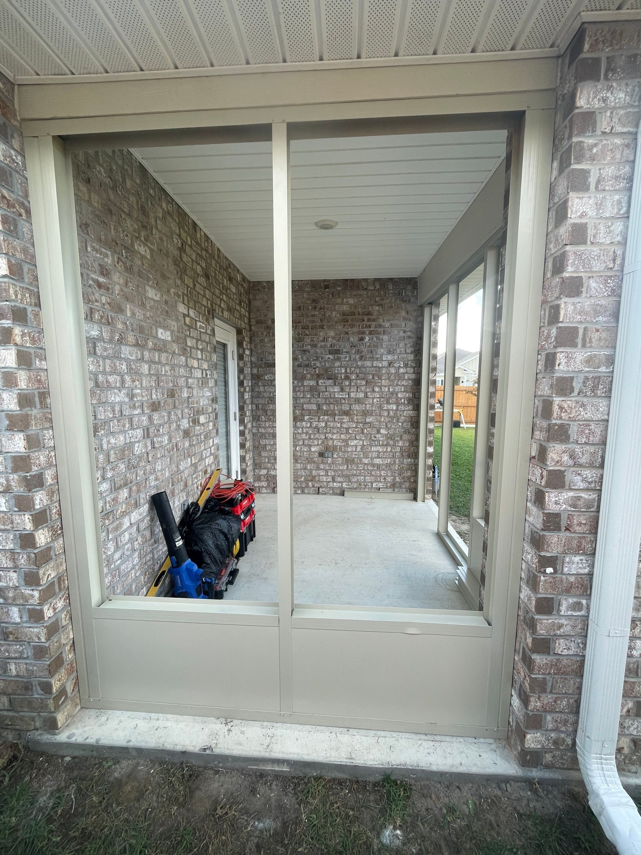Panama City Glass Room Under Existing Patio Cover by Titan Sunrooms