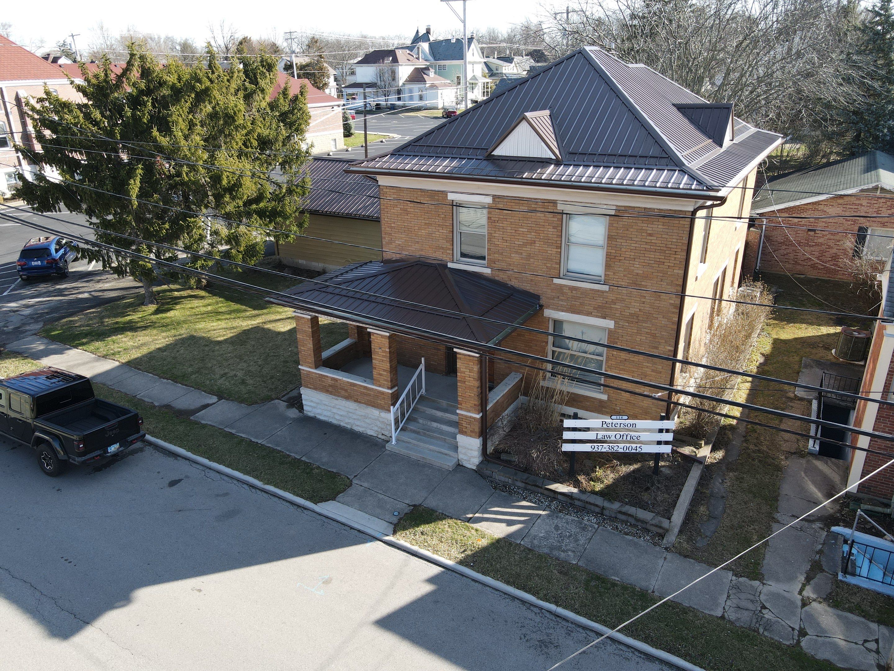 Residential Roofing Installation using Performance Panel Metal - Brown by RoofX