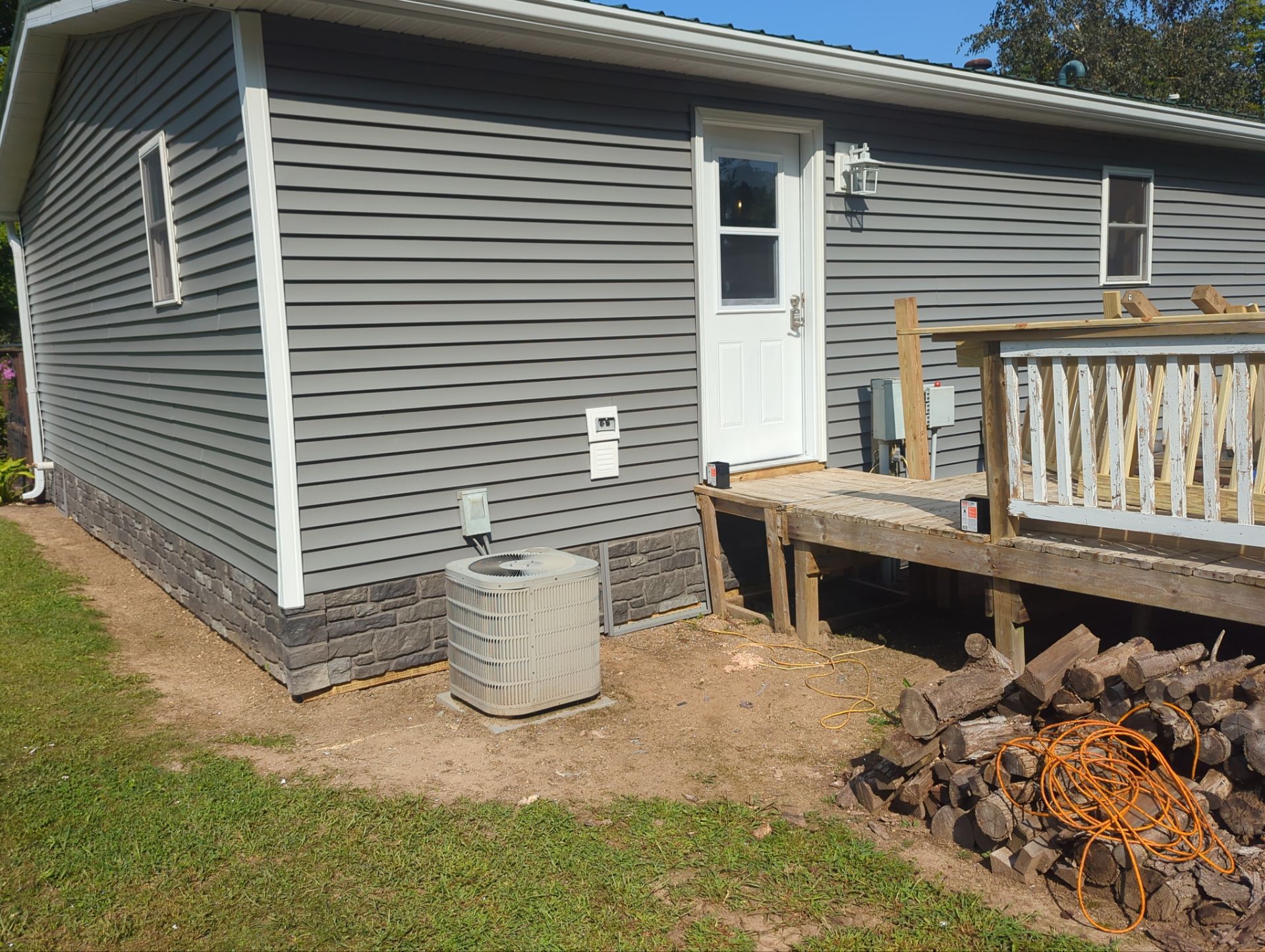 Siding Installation using CertainTeed Monogram Siding and Tando Stone. by Energy Plus Home Improvements