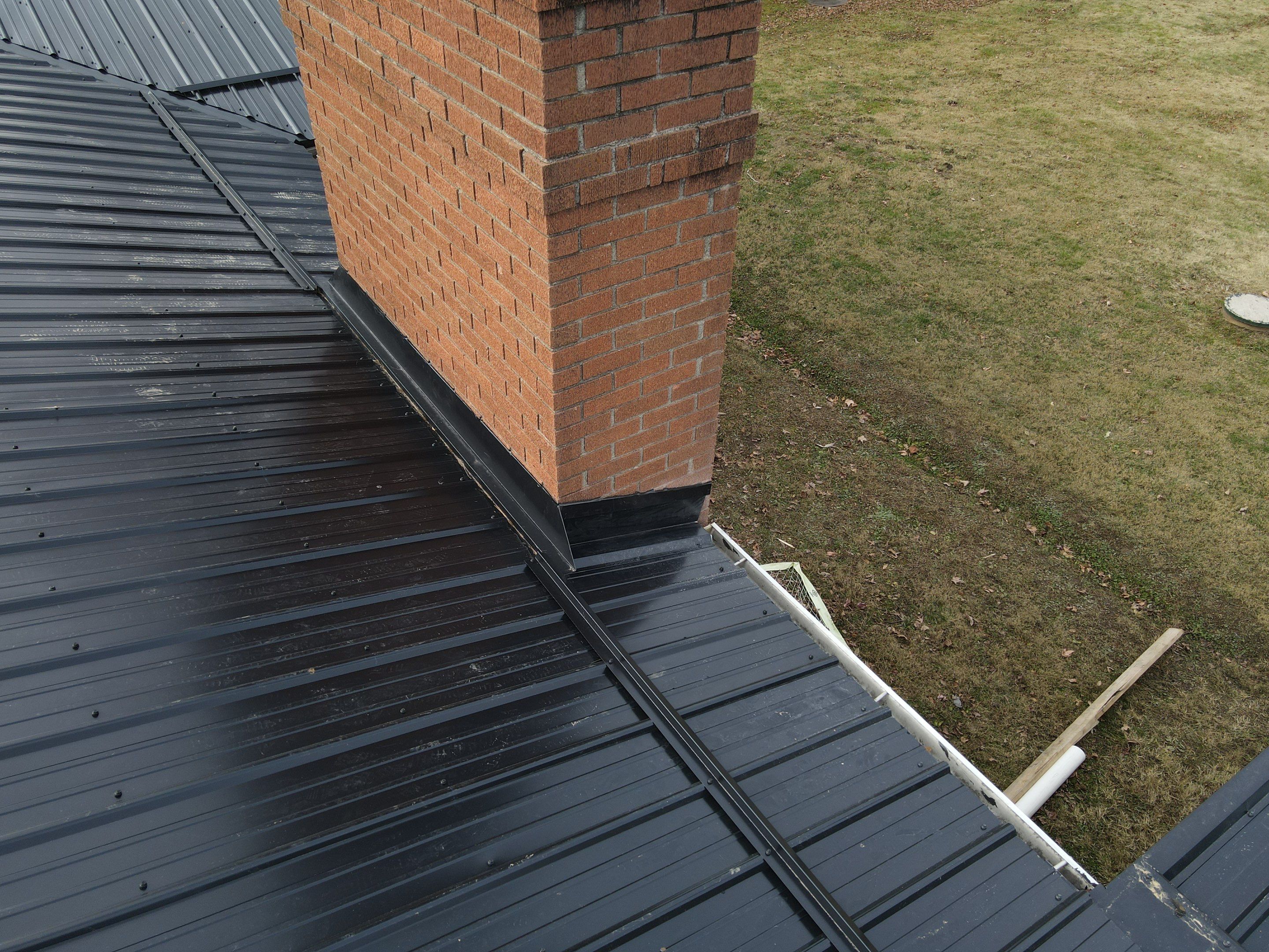 Residential Roofing Installation using Perfromance Panel Metal - Black by RoofX 