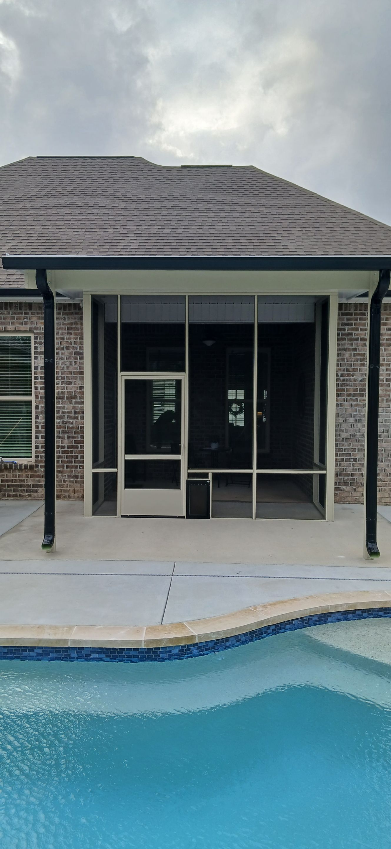 Screenroom Under Existing Canopy by Titan Sunrooms