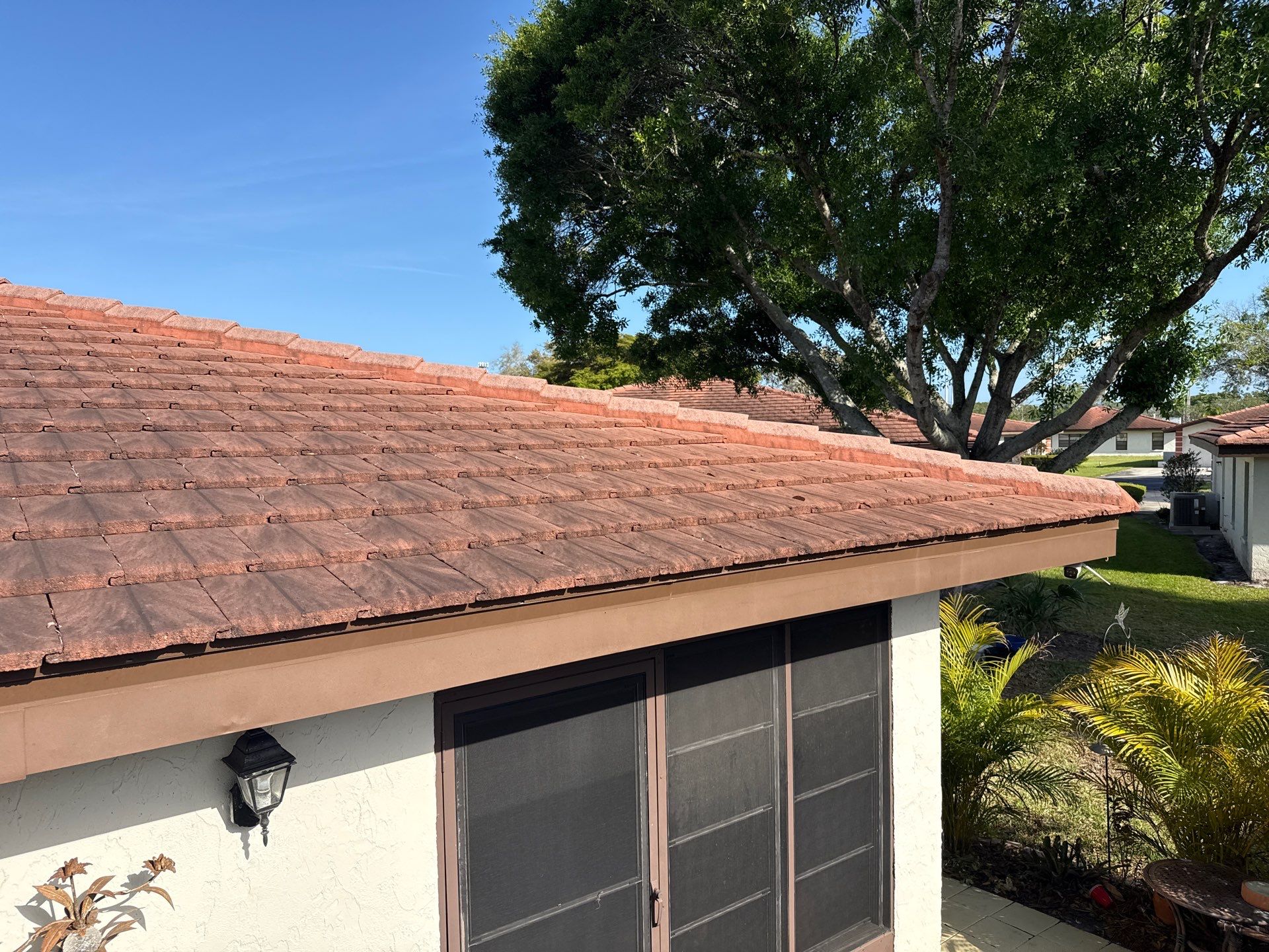 Tile Roof Cleaning in Vivienda at Bradenton, FL | No Roof Walking Method by Sunshine AquaWash