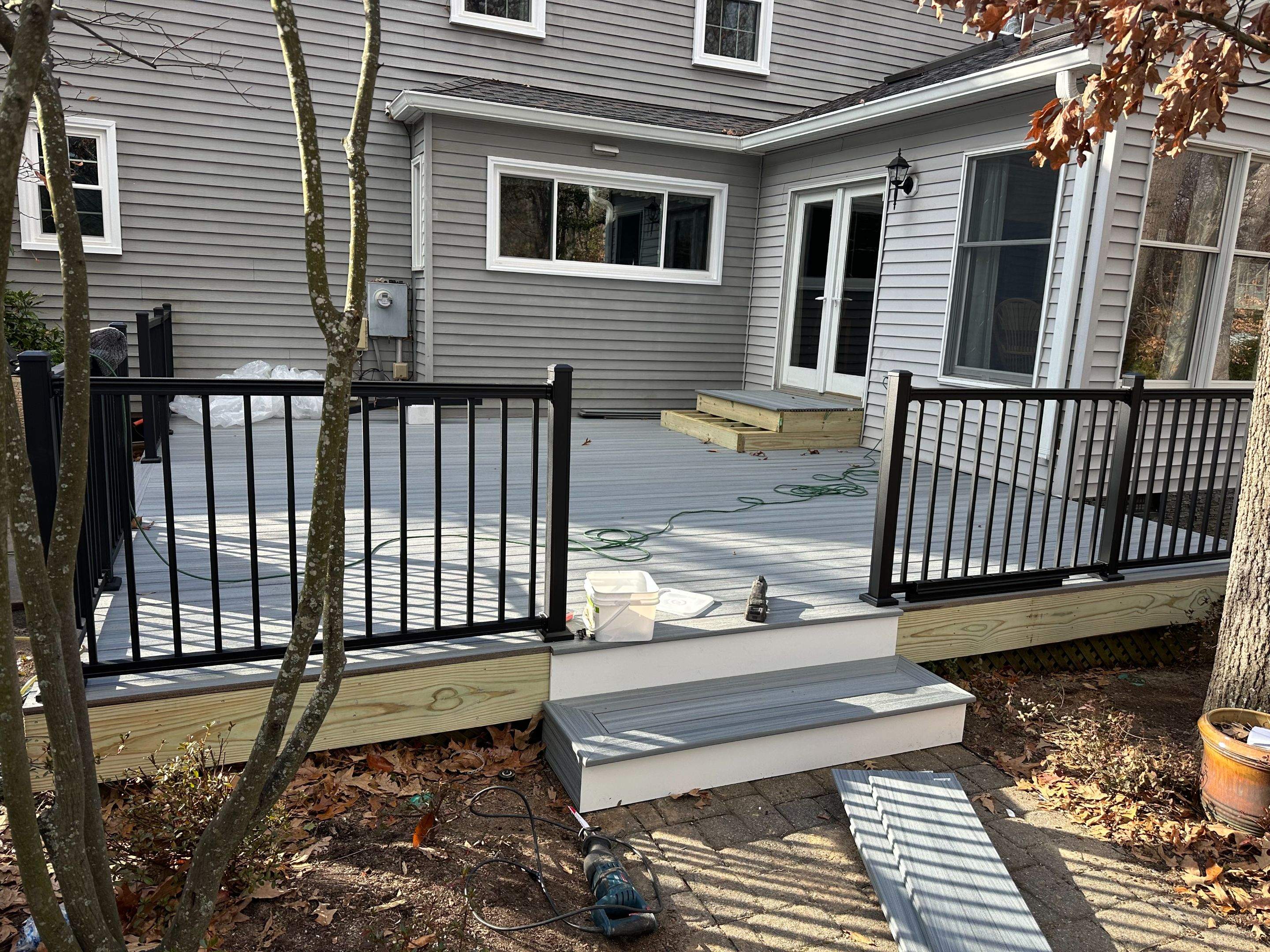 Trex Deck Resurfacing & New Railing in Sterling, VA by Sunburst Construction Inc