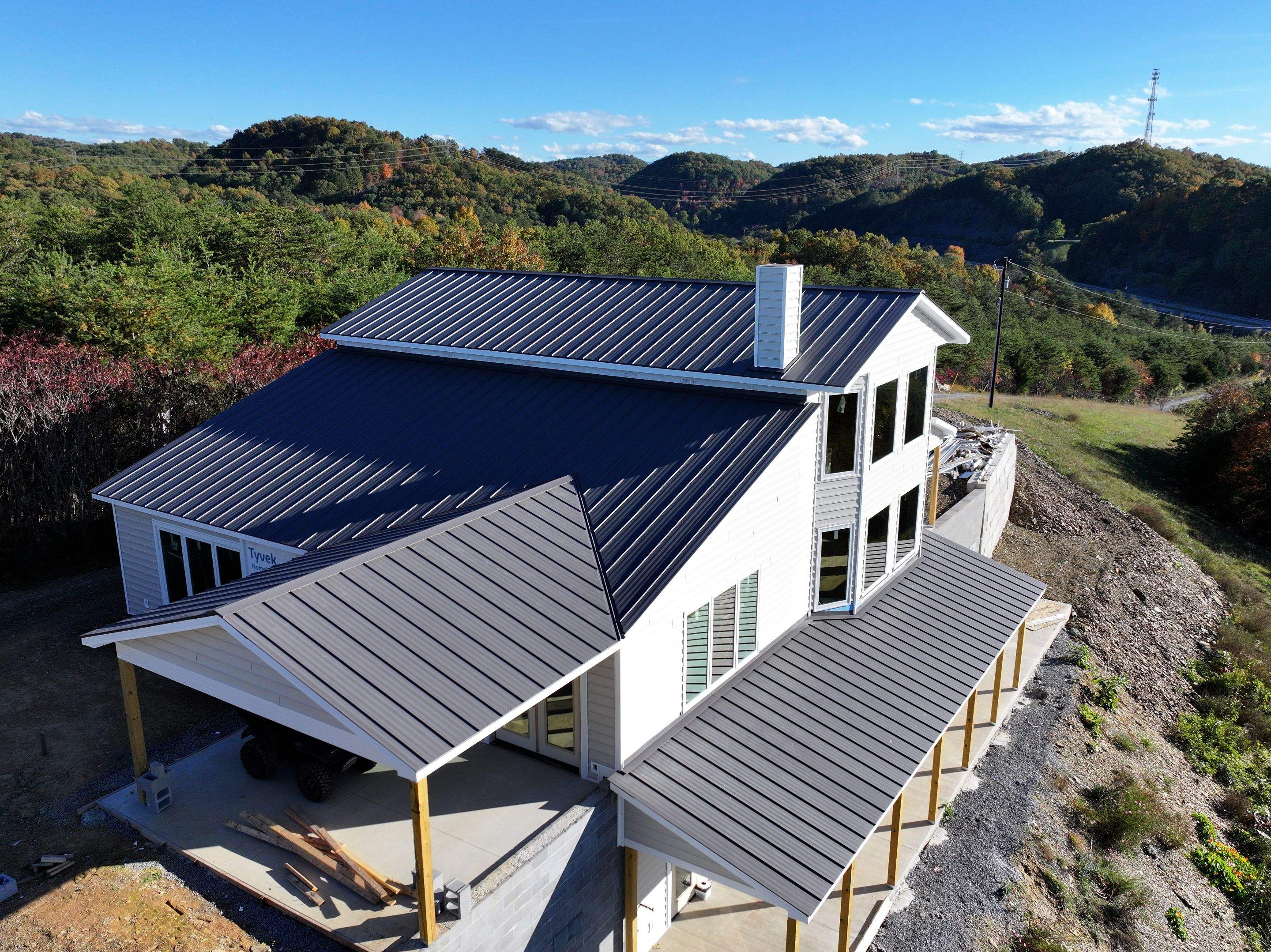 Textured Charcoal Gray Standing Seam by Omnia Roofing