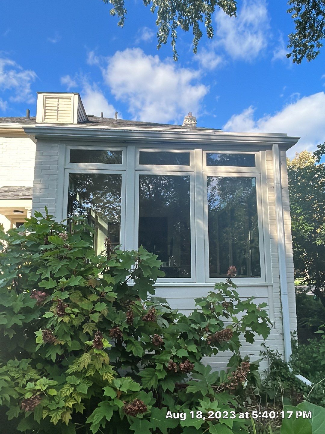 Window Installation using Andersen Windows E-Series with aluminum clad by Smart Roof