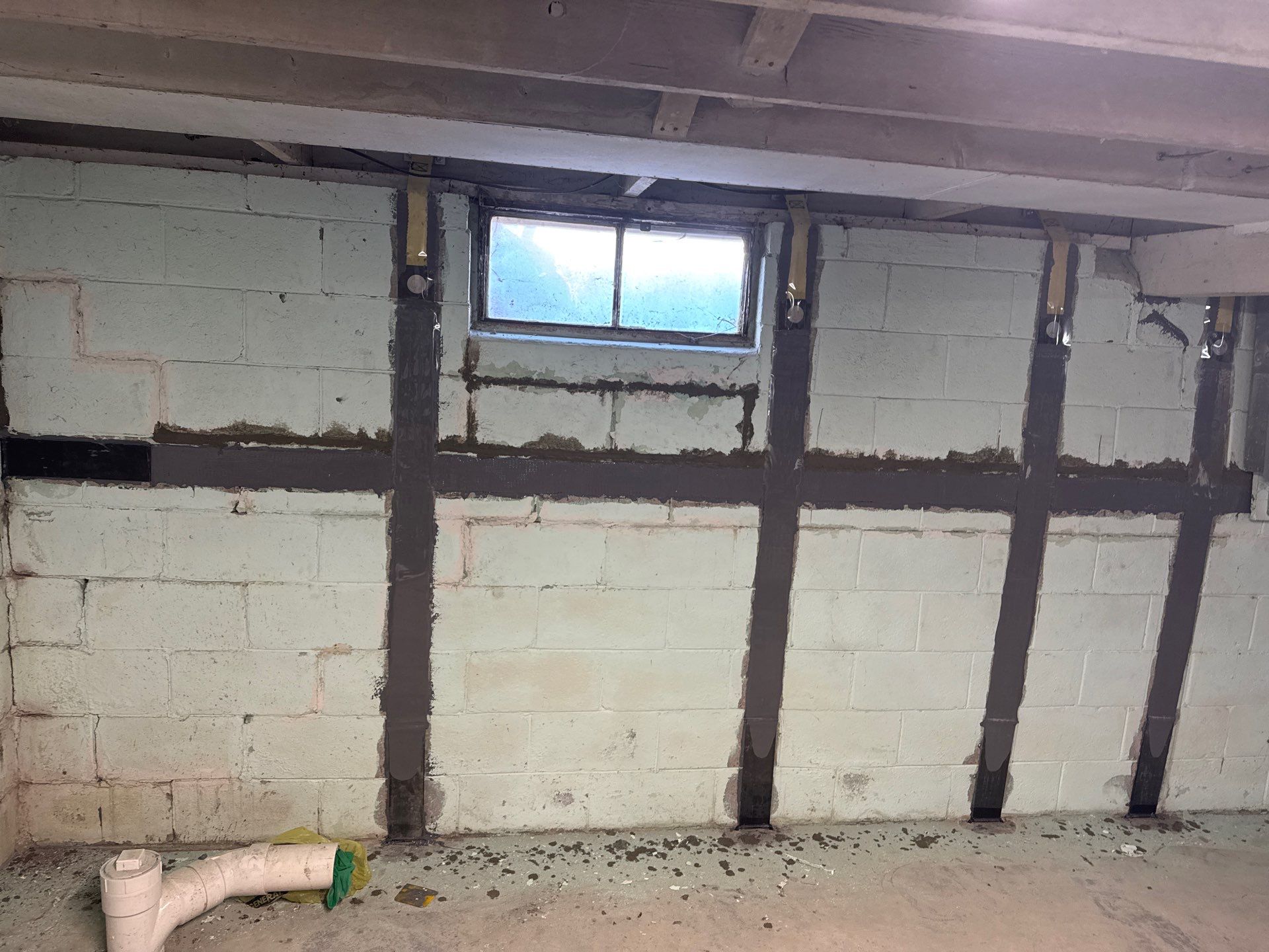 Wall Straightening/Stabilization by ACE Waterproofing & Basement Solutions