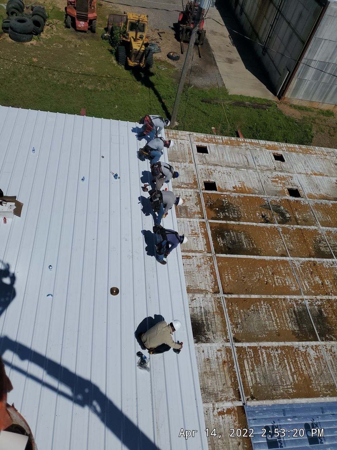 Commercial Roofing Installation using Aluminum Roofing panels by Hostetler Roofing