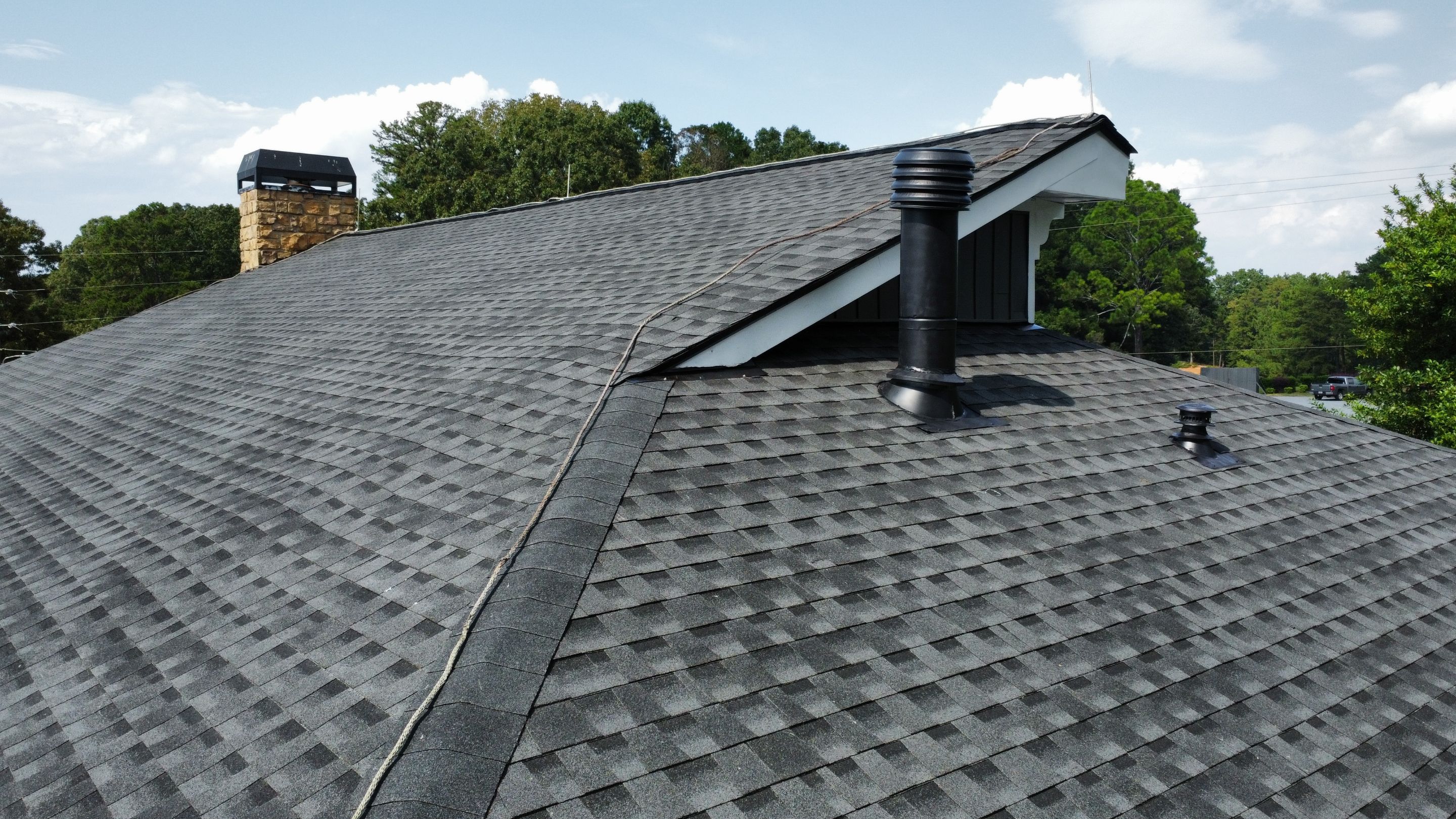 Country Club Roofing Installation by Reset Roofing