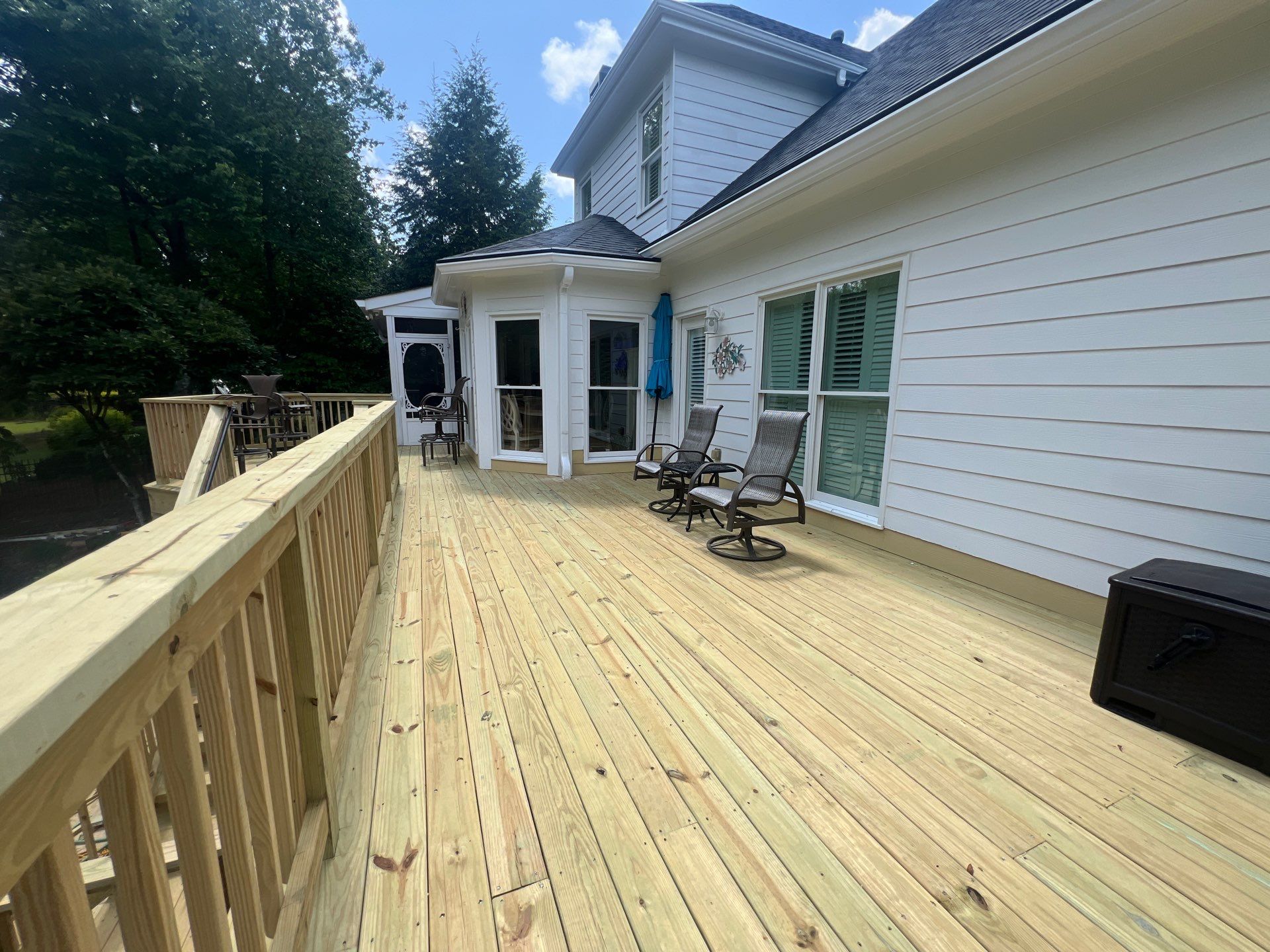 Multi-Level Pressure-Treated Wood Deck and Screened Porch in Acworth by Swift Home Renovations