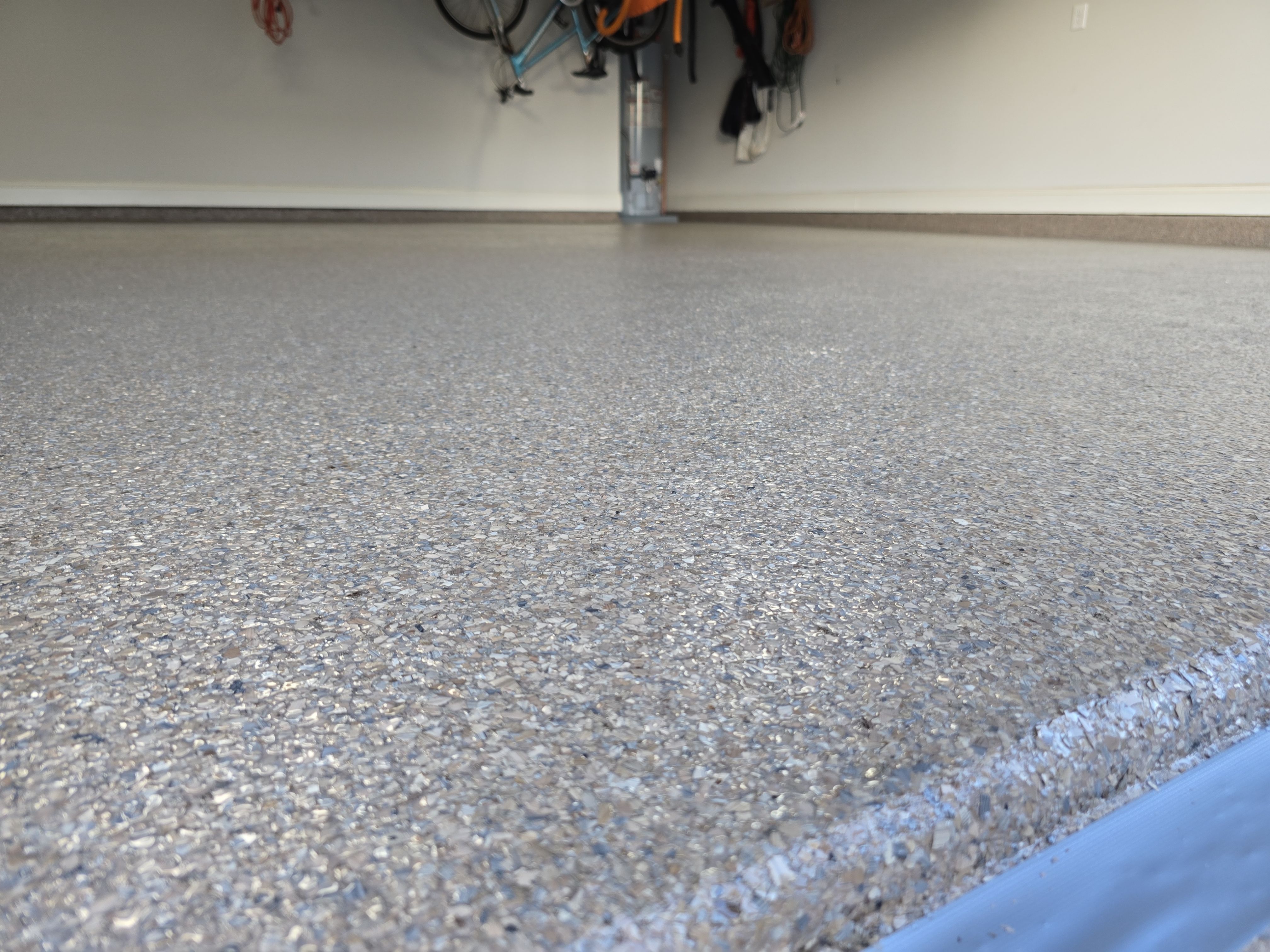 Driveway & Garage Using Obsidian by Elite Floor Solutions