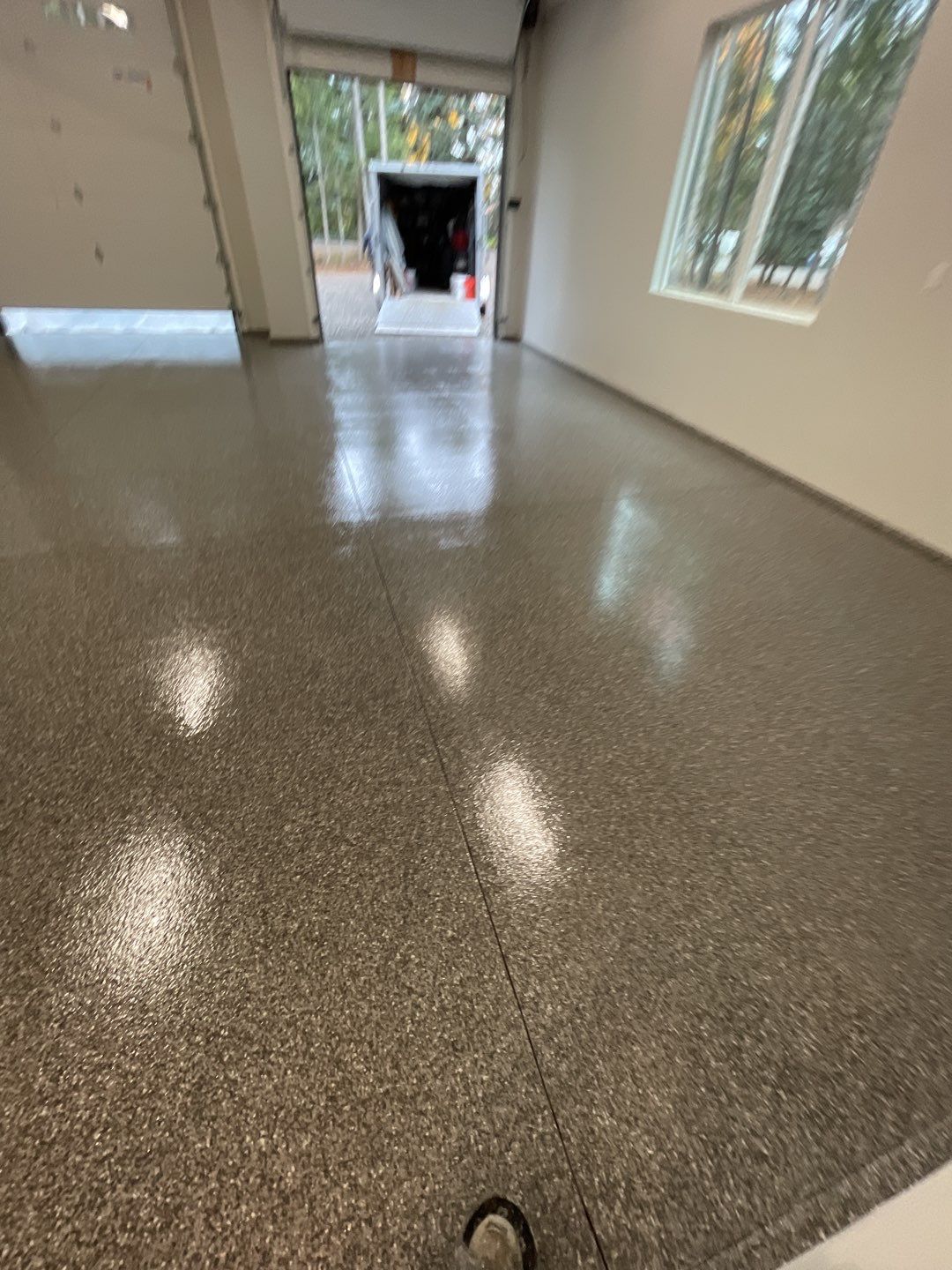 Garage Transformation using Silver Creek and the Penntek Evolution Flooring System by Croc Coatings, LLC