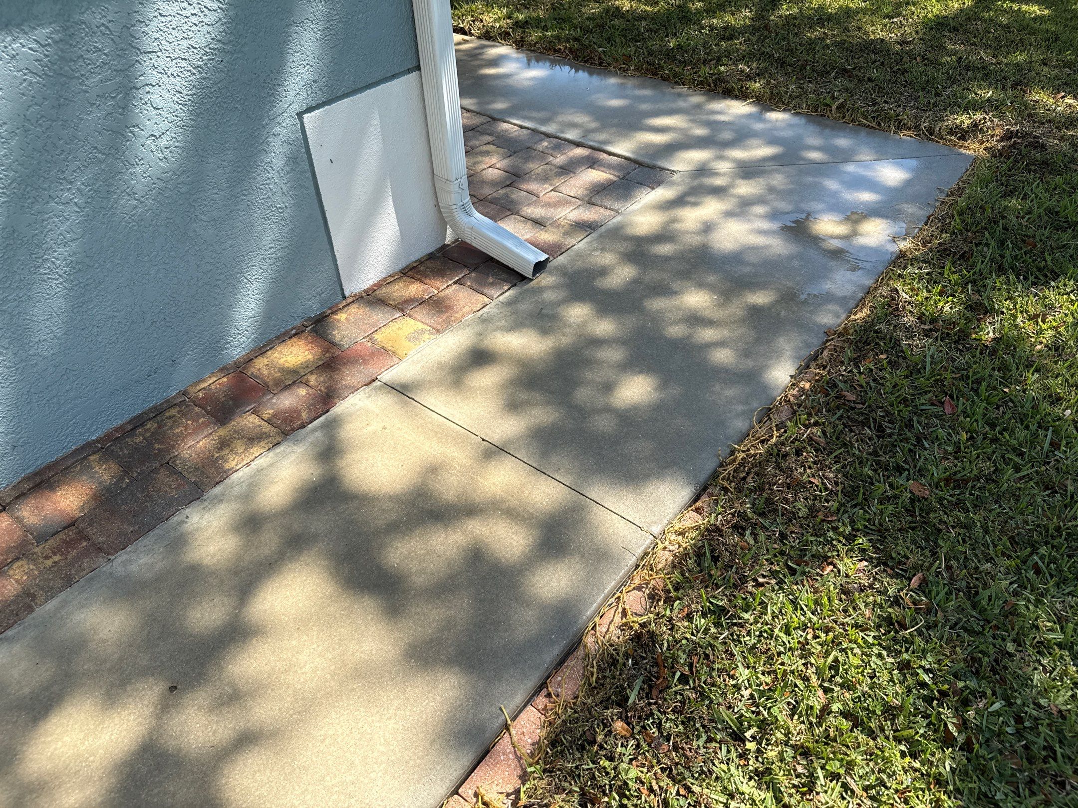Concrete Driveway, Entryway & Street Curbing Cleaning | Foster’s Creek Community | Palmetto, FL by Sunshine AquaWash