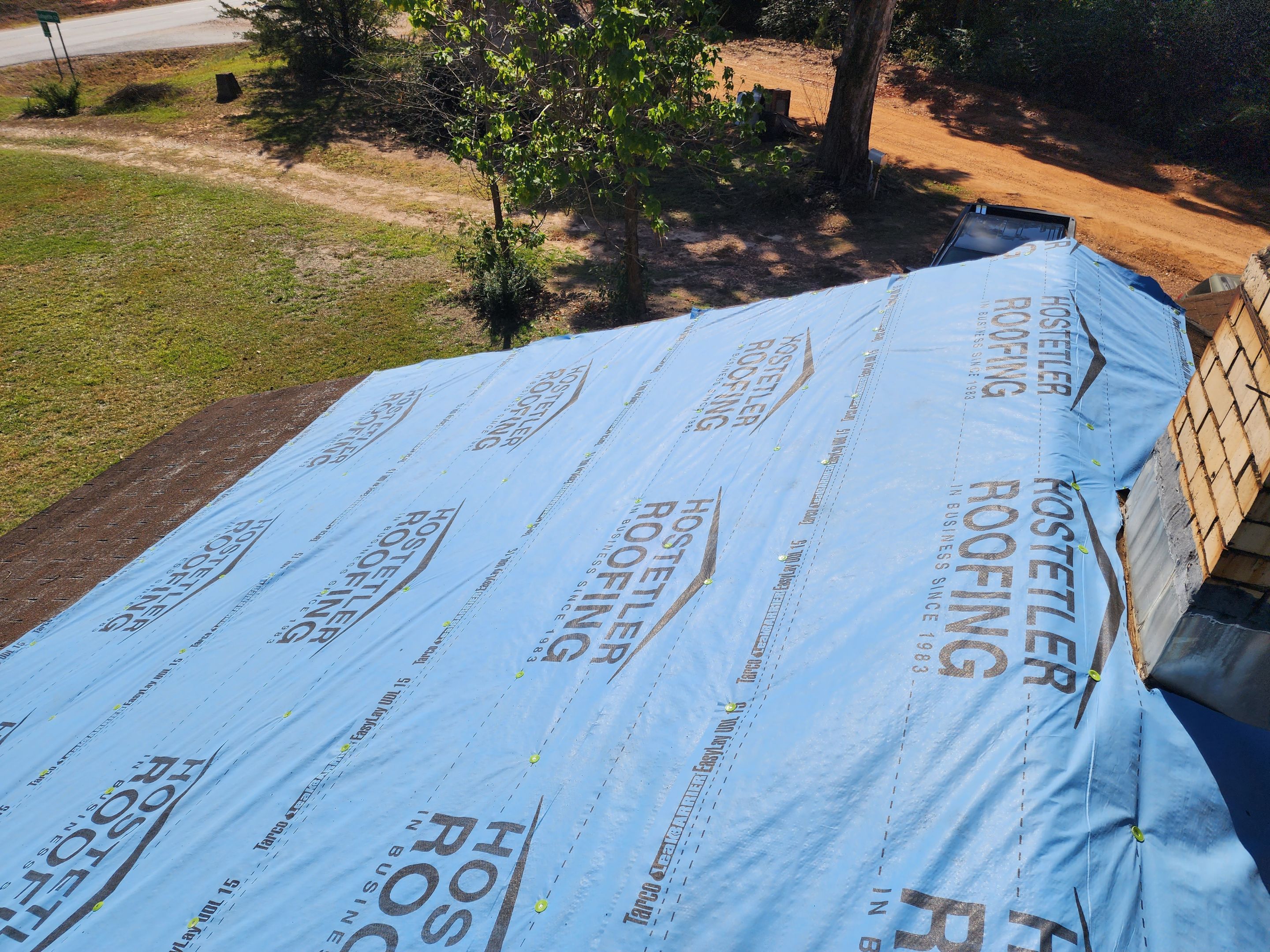 Residential Roofing Repair using Malarkey Highlander: Natural Wood by Hostetler Roofing