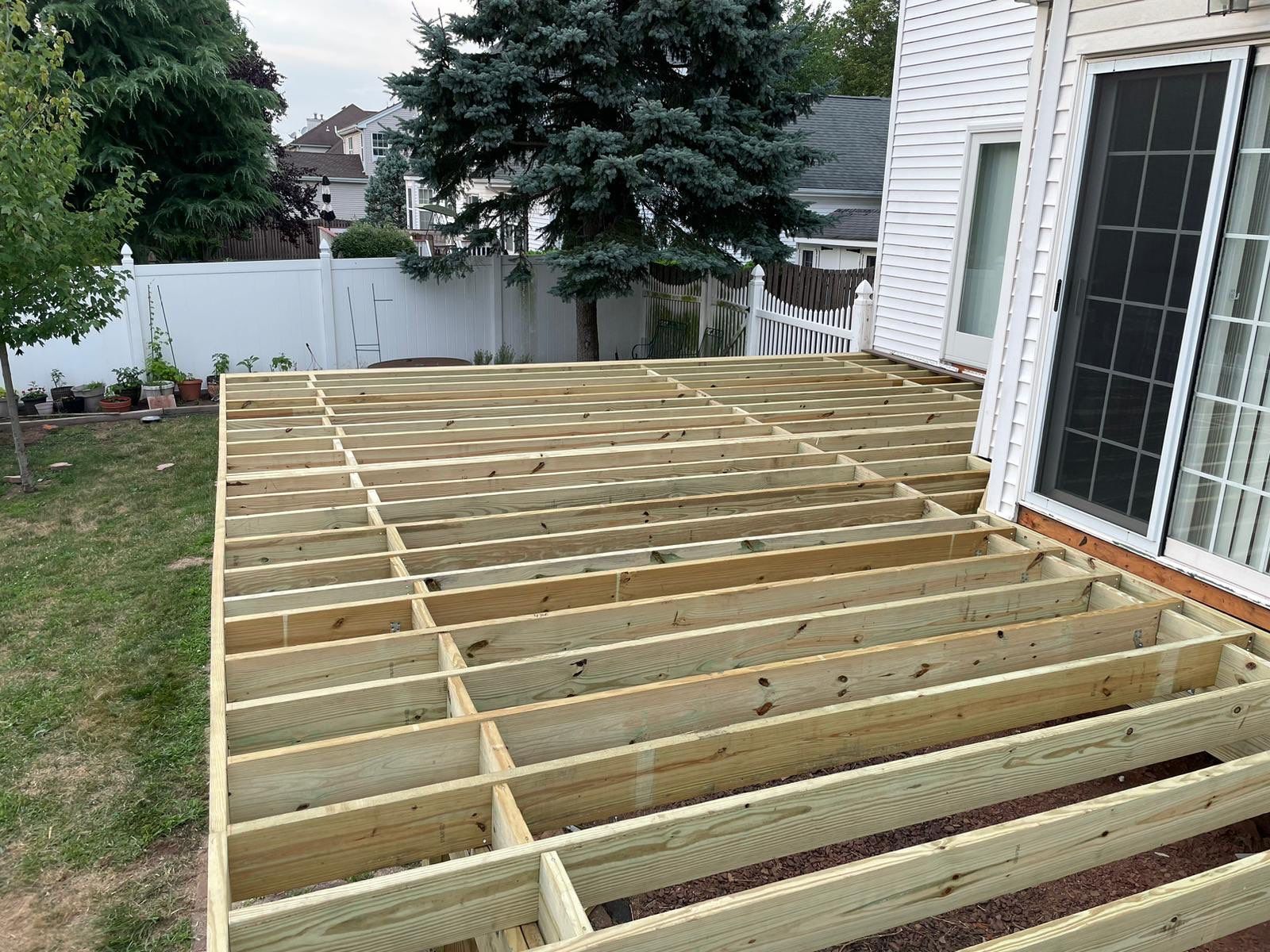 New Deck with Pergola and Vinyl Lattice by deck guardian
