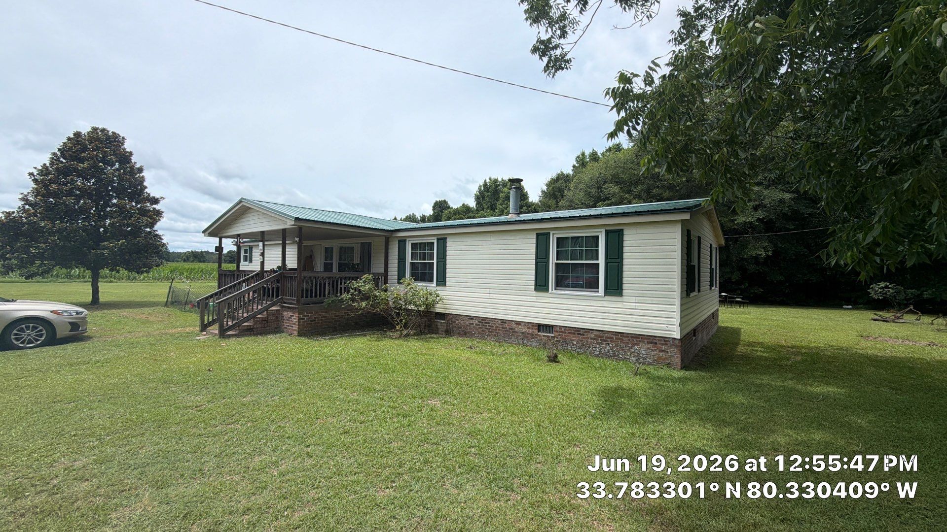 Standing Seam Green Metal Roof Installation in Sumter by Exterior Genie, LLC