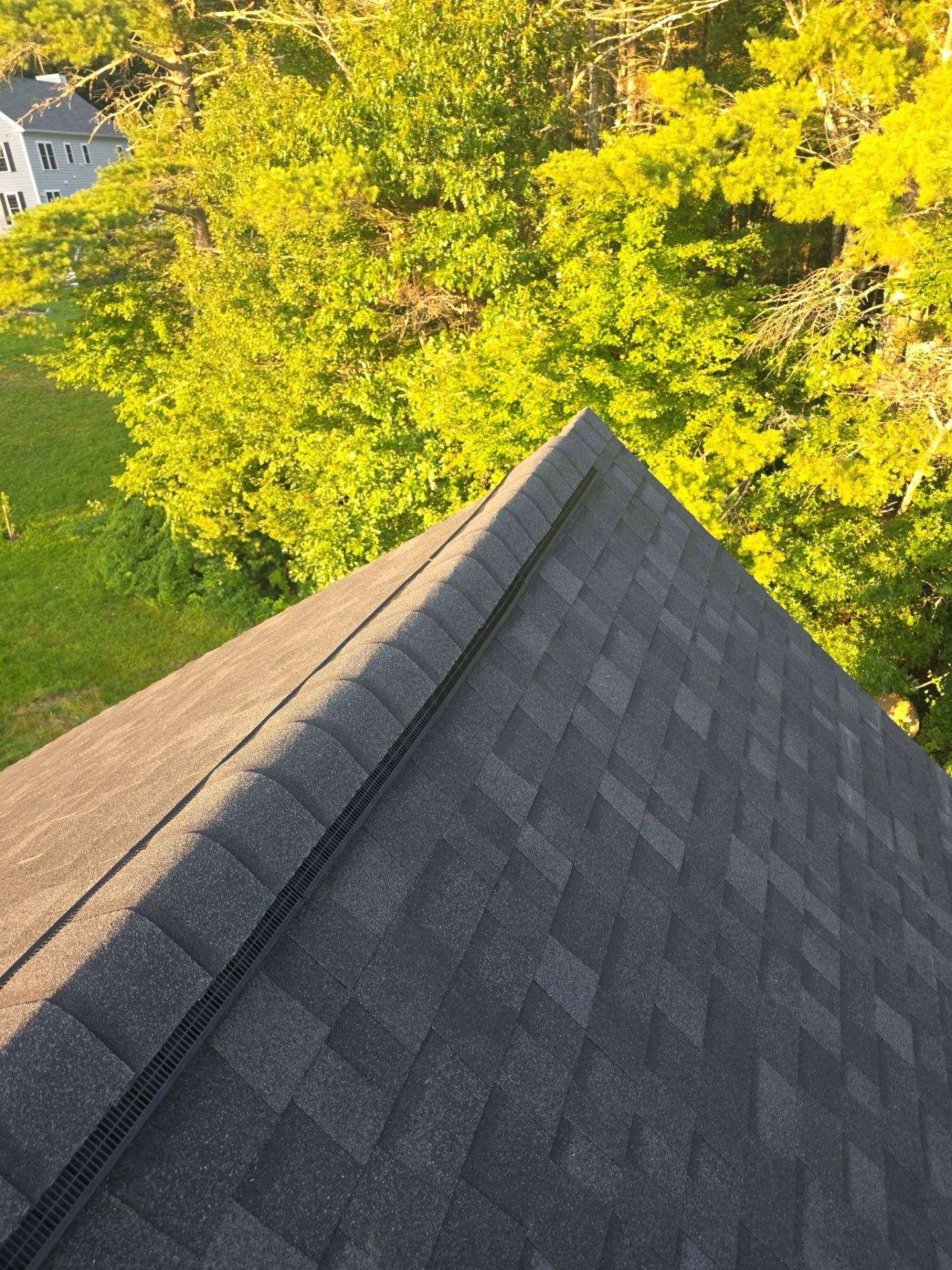 Merrimack NH ADU Roof Installation with Owens Corning Onyx Black Shingles and Standing Seam Metal Accents by Compass exteriors