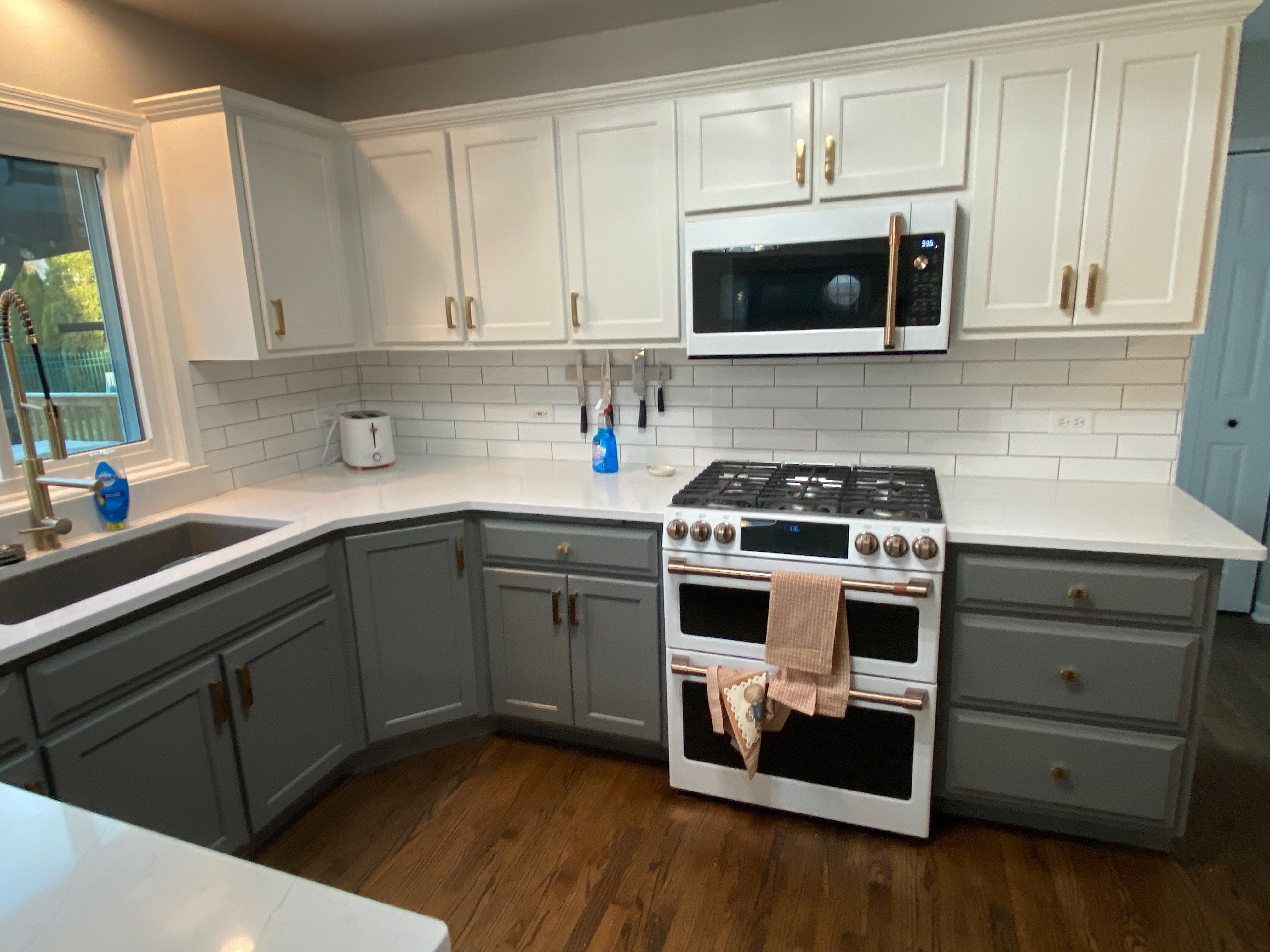 Two-Tone Kitchen Cabinet Painting & Staircase Painting in New Lenox by Powers Painting & Decorating, LLC