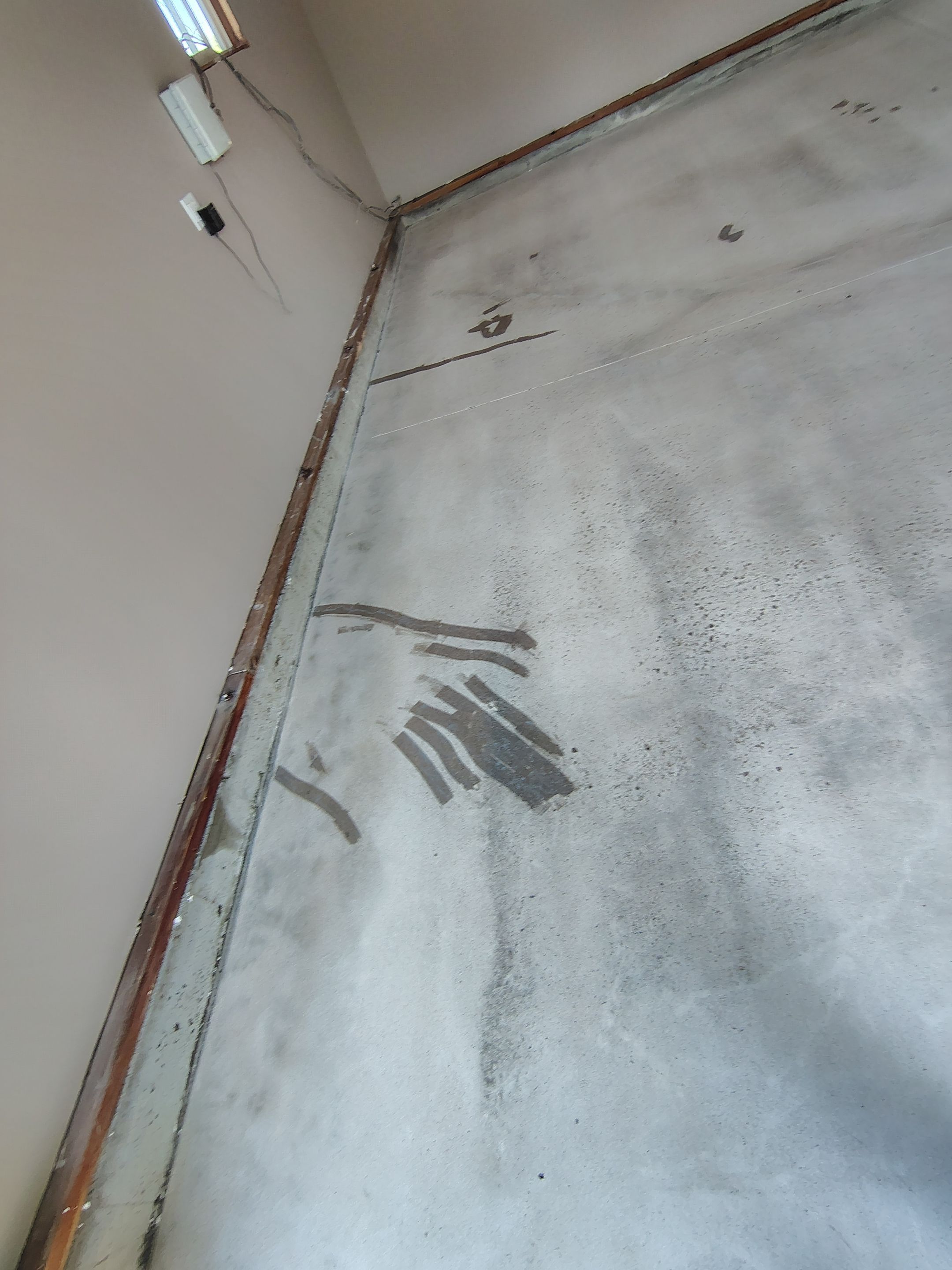 Sioux Falls Garage Concrete Repair and Epoxy Flake Floor Coating by Select Painting, Coatings & Garage Cabinets
