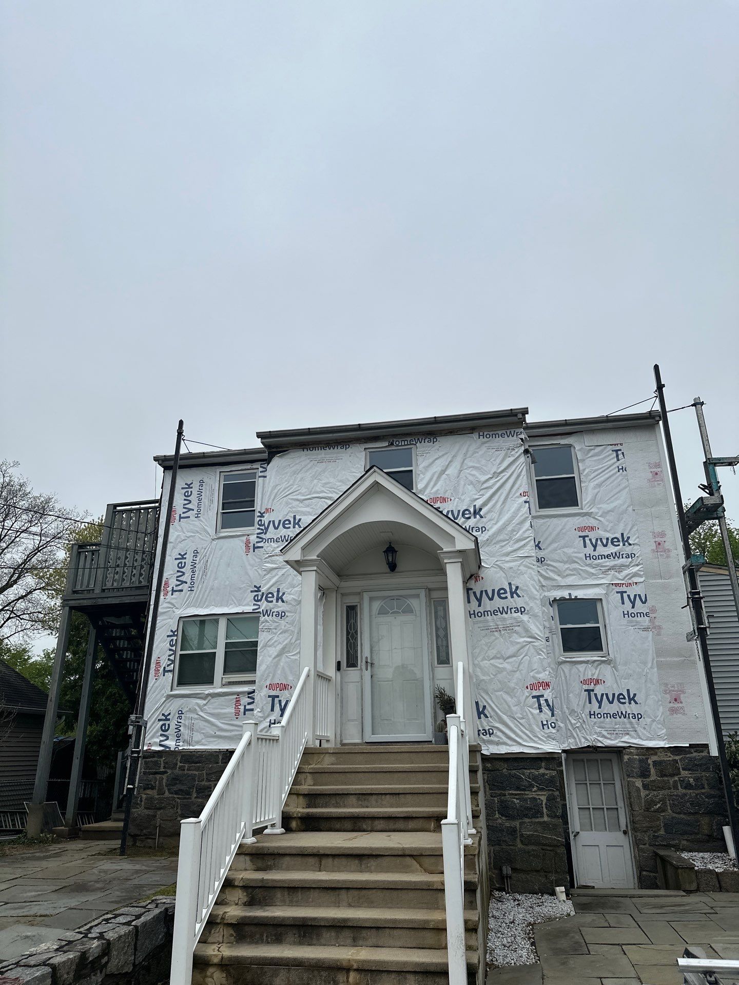 Siding Installation using Certainteed Cedar Impressions Straight Edge Perfection Shingles - D7 - Sterling Gray by A Plus Exterior