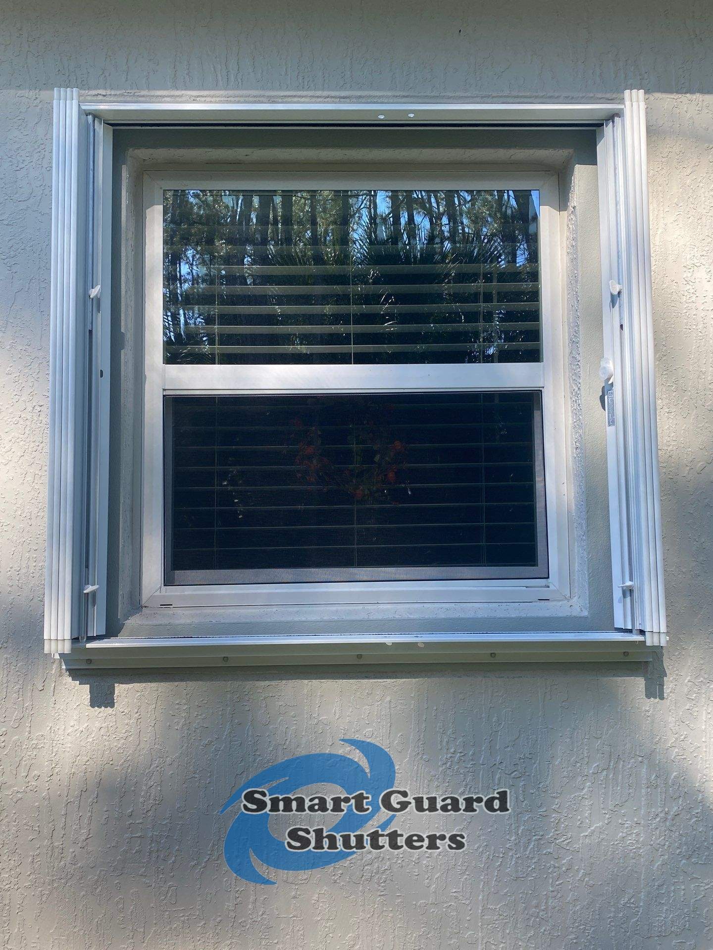 Hurricane Protection by Smart Guard Shutters