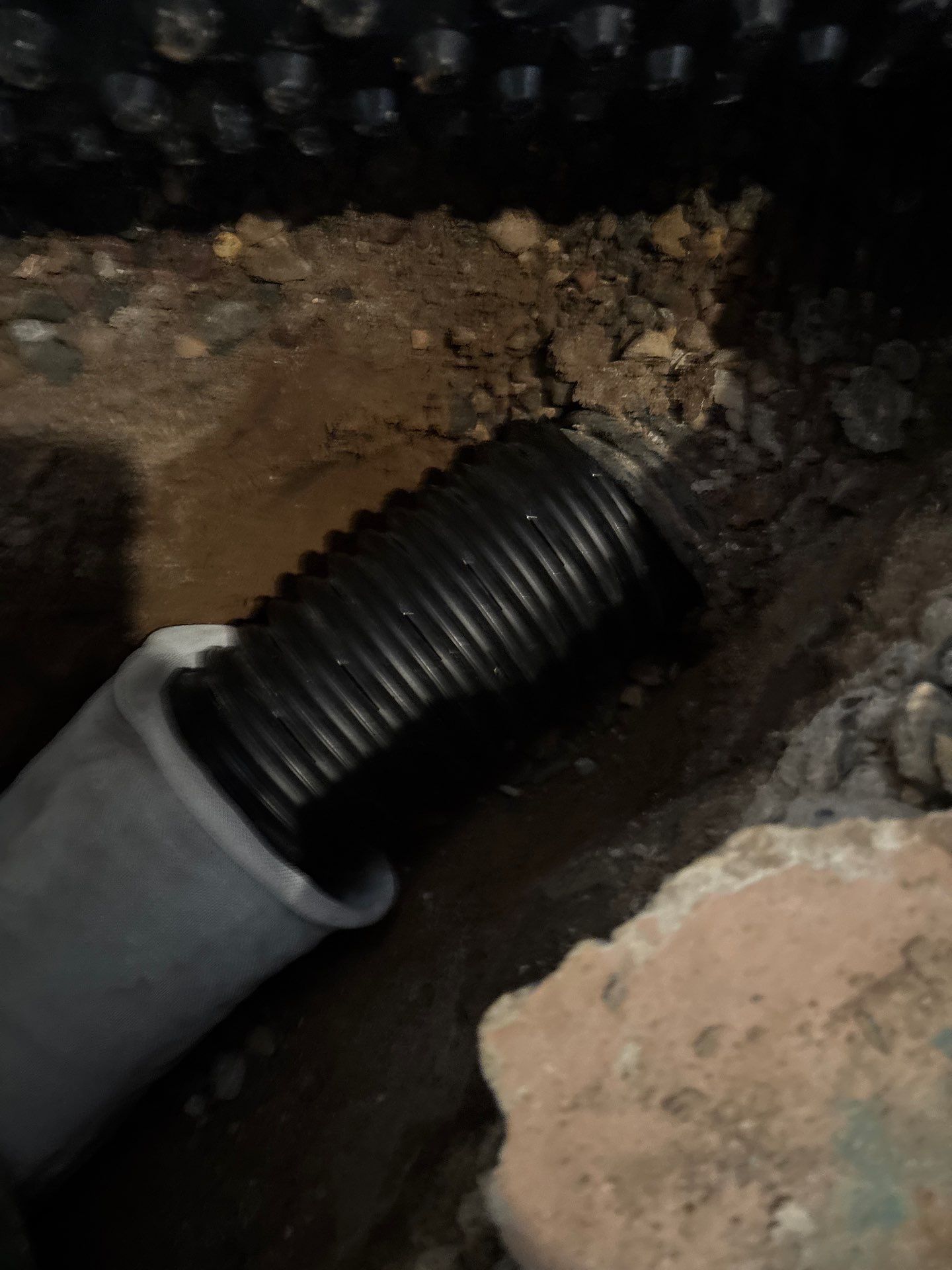 Completing the Connection for Lisa's Drain Tile System by Waterproofing Northeast