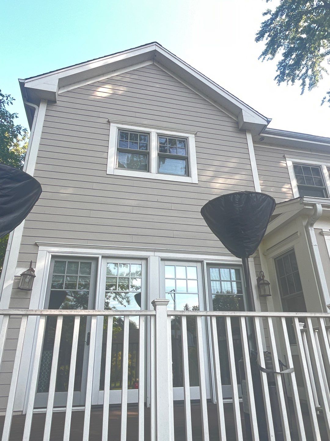 Hardie Board House & Detached Garage Soft Washing by Northern Power Washing LLC.