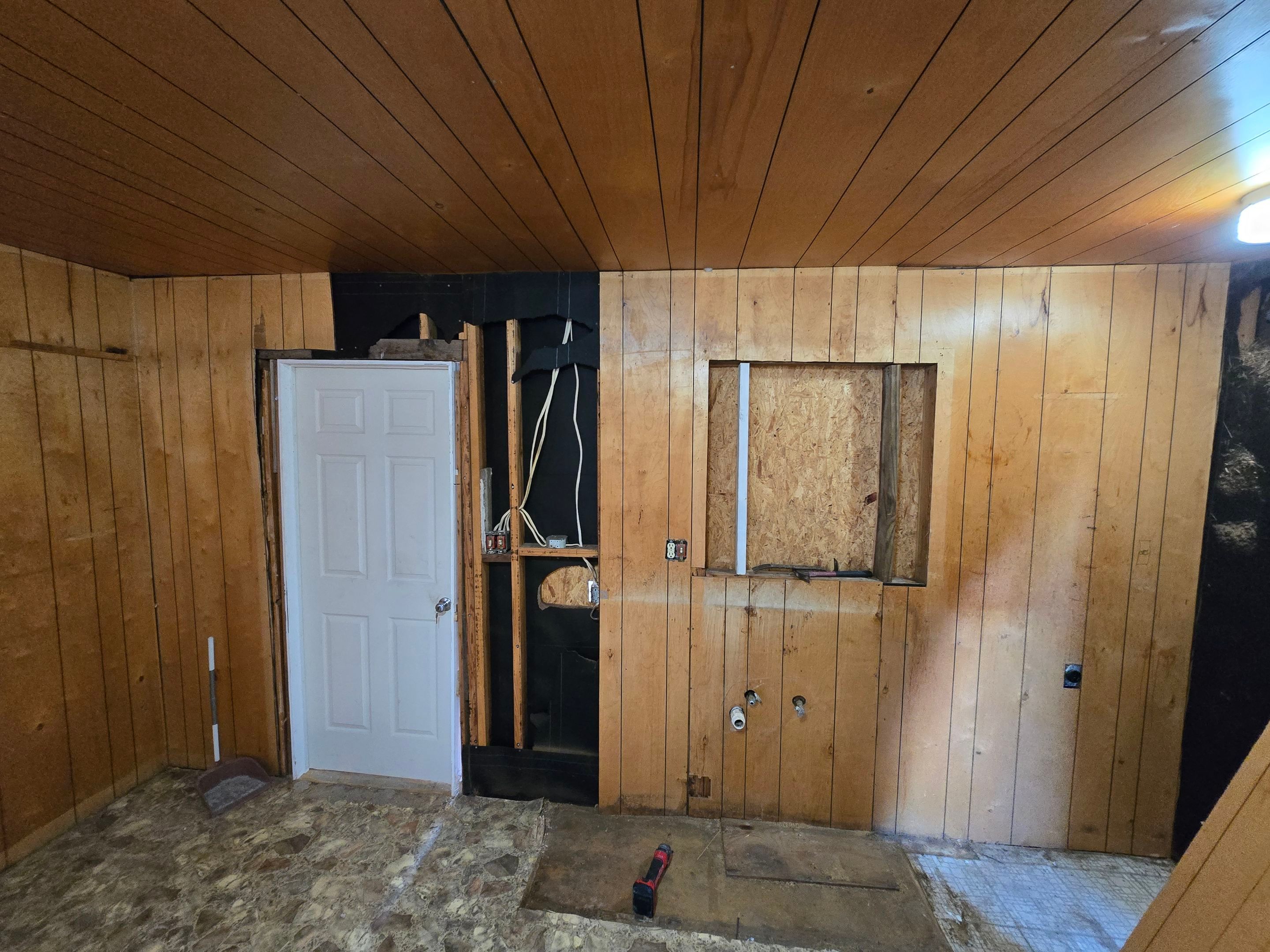 Paneling to Sheetrock Conversion by Very Good Construction Company