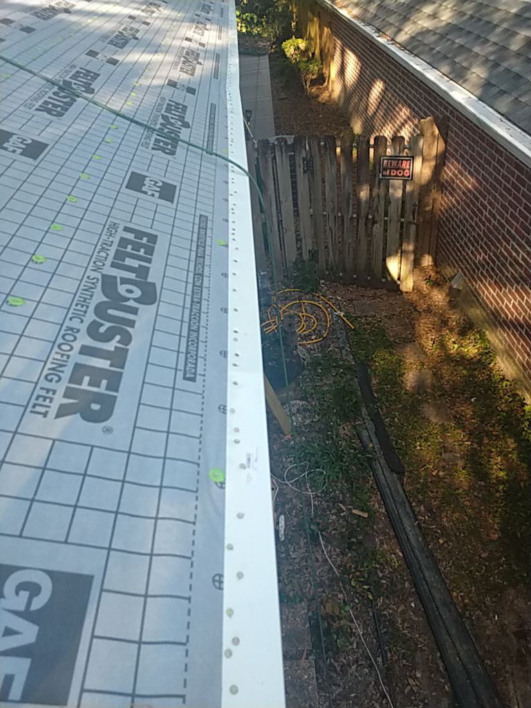 Residential Roofing Installation using Roof Replacement by American Roofing & Construction LLC
