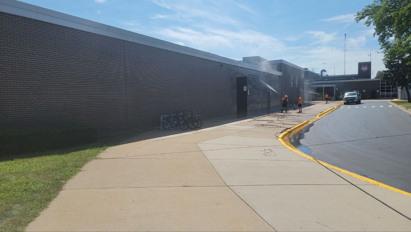 commercial pressure washing using Algaecide, soft wash soap by Northern Power Washing LLC.