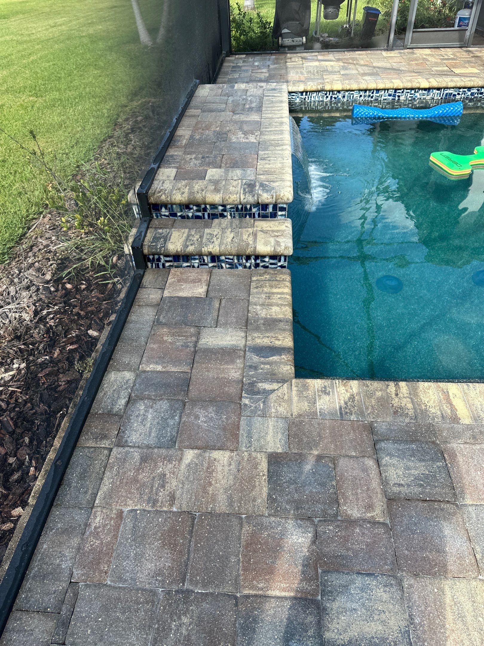 Paver Driveway, Sidewalk, and Pool Deck Cleaning in Winding River Community, Bradenton, FL by Sunshine AquaWash