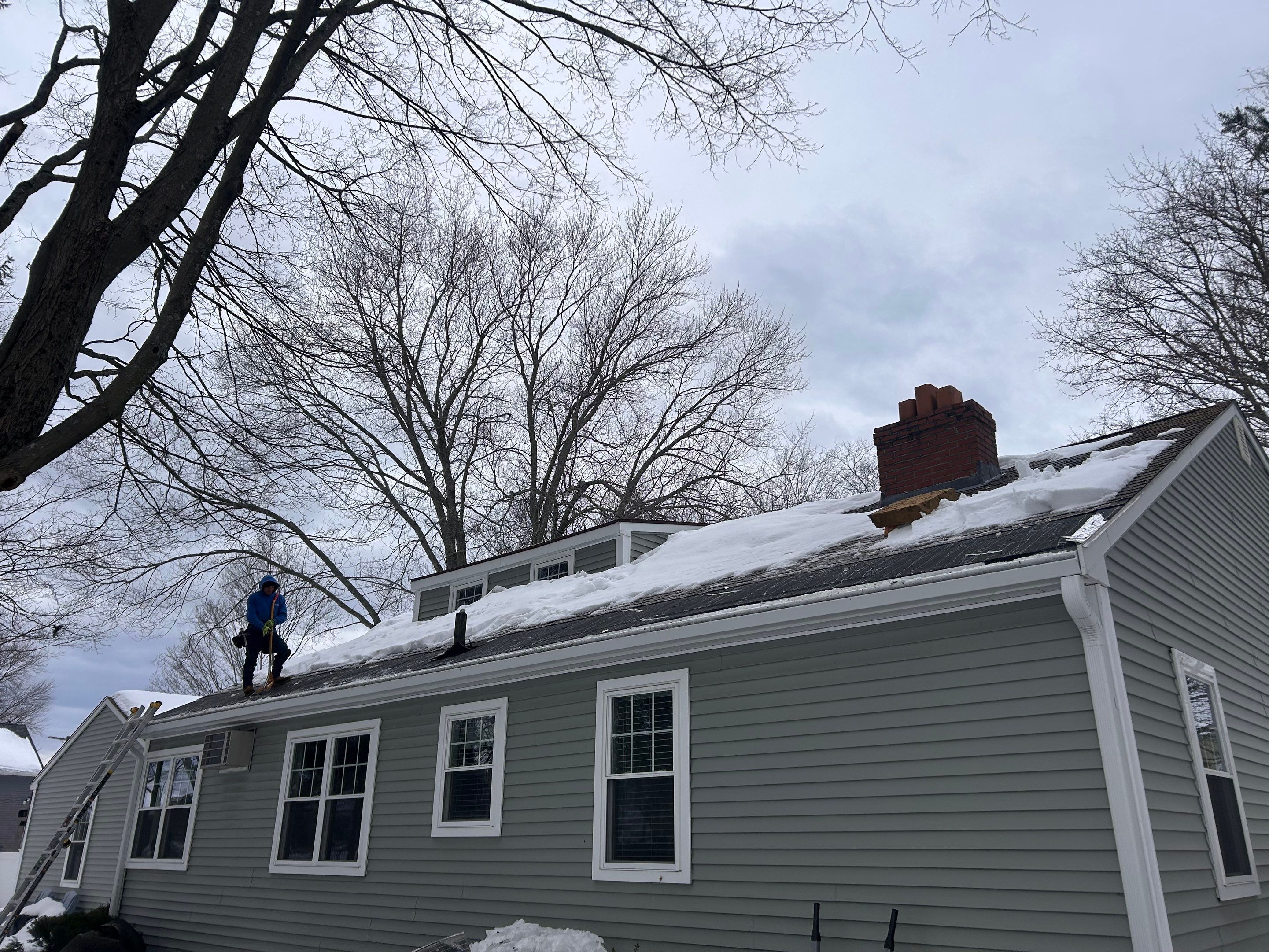 Snow/Ice Belt & Ice Dam Removal Project in Woburn by Mighty Dog Roofing of Greater Middlesex County